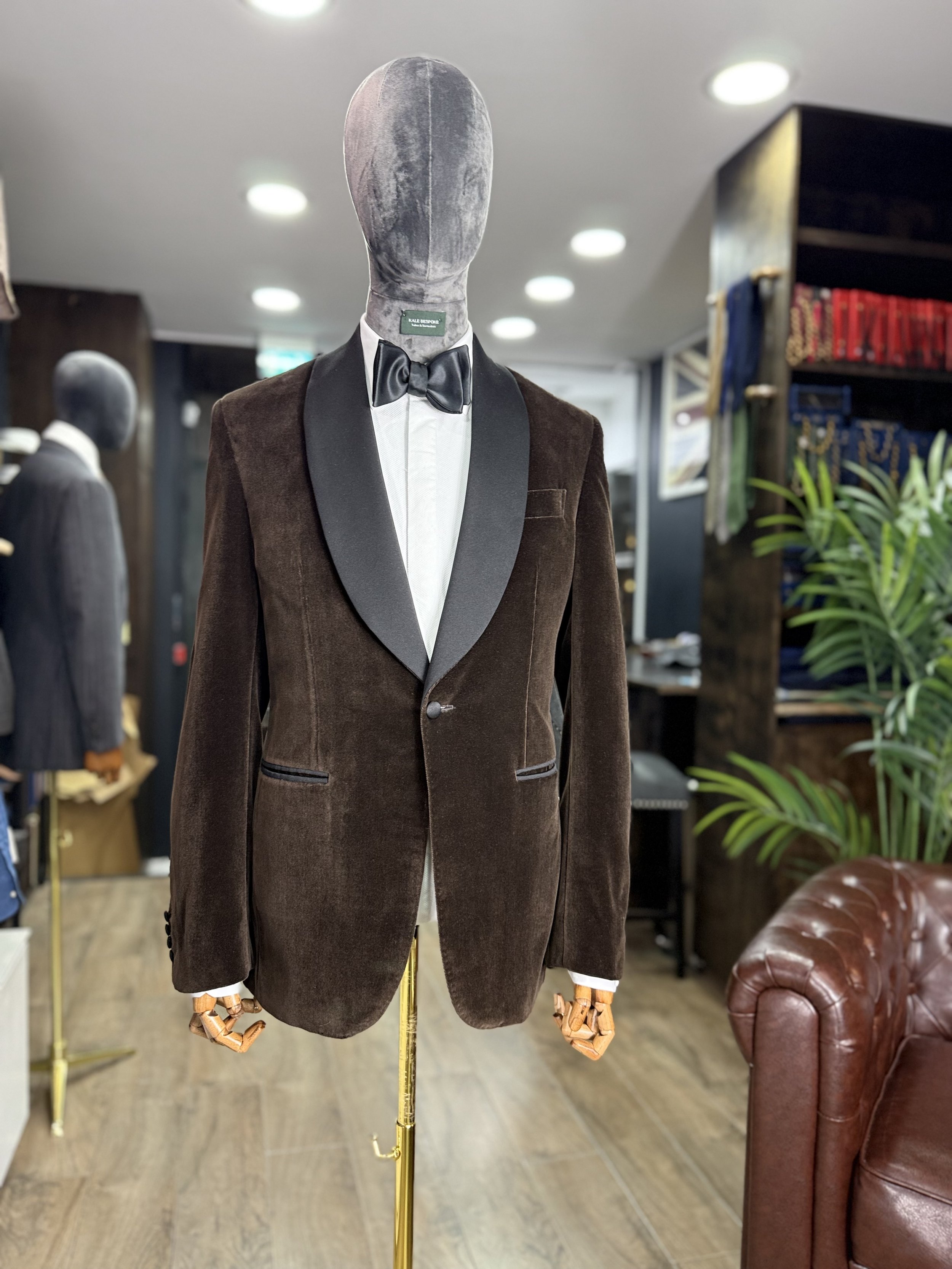 Bespoke Scabal brown velvet tuxedo jacket with black silk shawl lapel, styled with a marcella front dress shirt and bow tie.Made and fitted in our City of London tailoring house near Bank.
