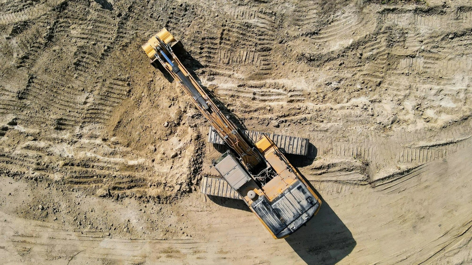 Excavator digging dirt