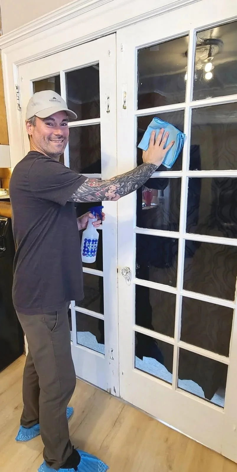 Hillshine Cleaning Duluth LLC staff cleaning French doors during a Deep Clean in Duluth, MN