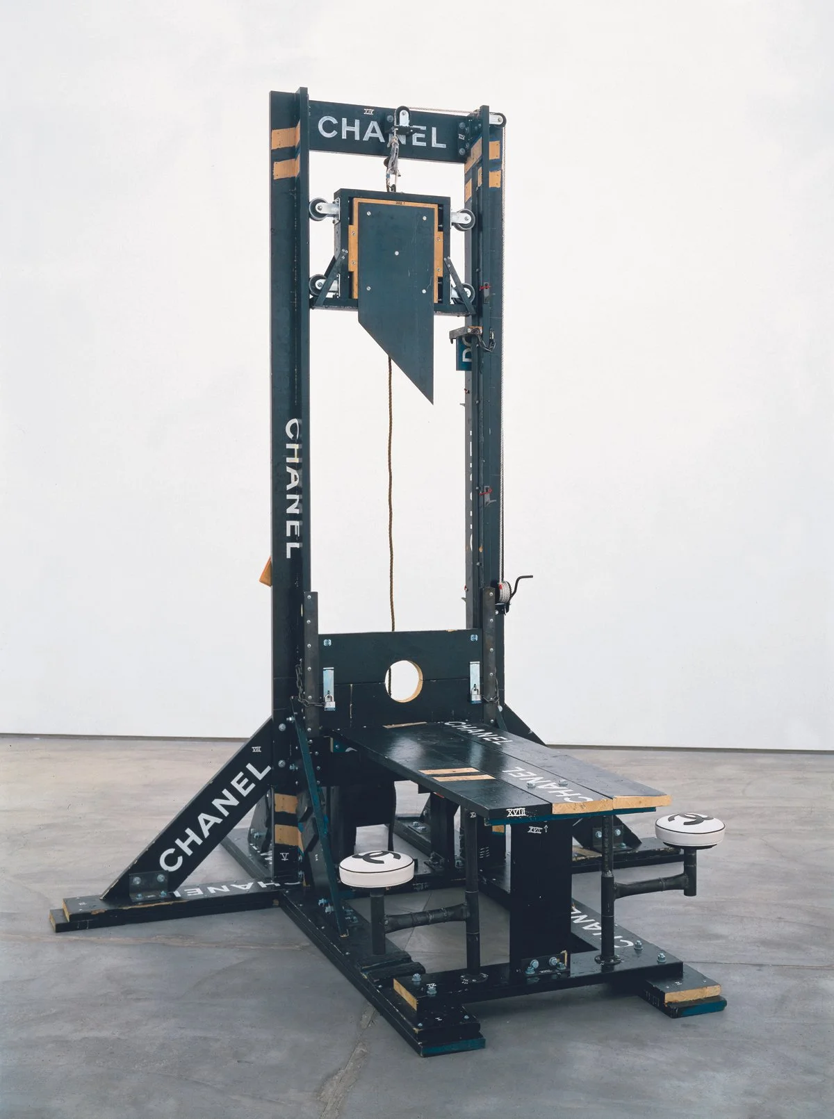  Tom Sachs,  Chanel Guillotine (Breakfast Nook),  1998. Artwork © Tom Sachs (page 75) Found wooden police barrier, latex, steel, leather, and hardware; 12 ft. 3 in. × 10 ft. 2 in. × 10 ft. 5 in. 