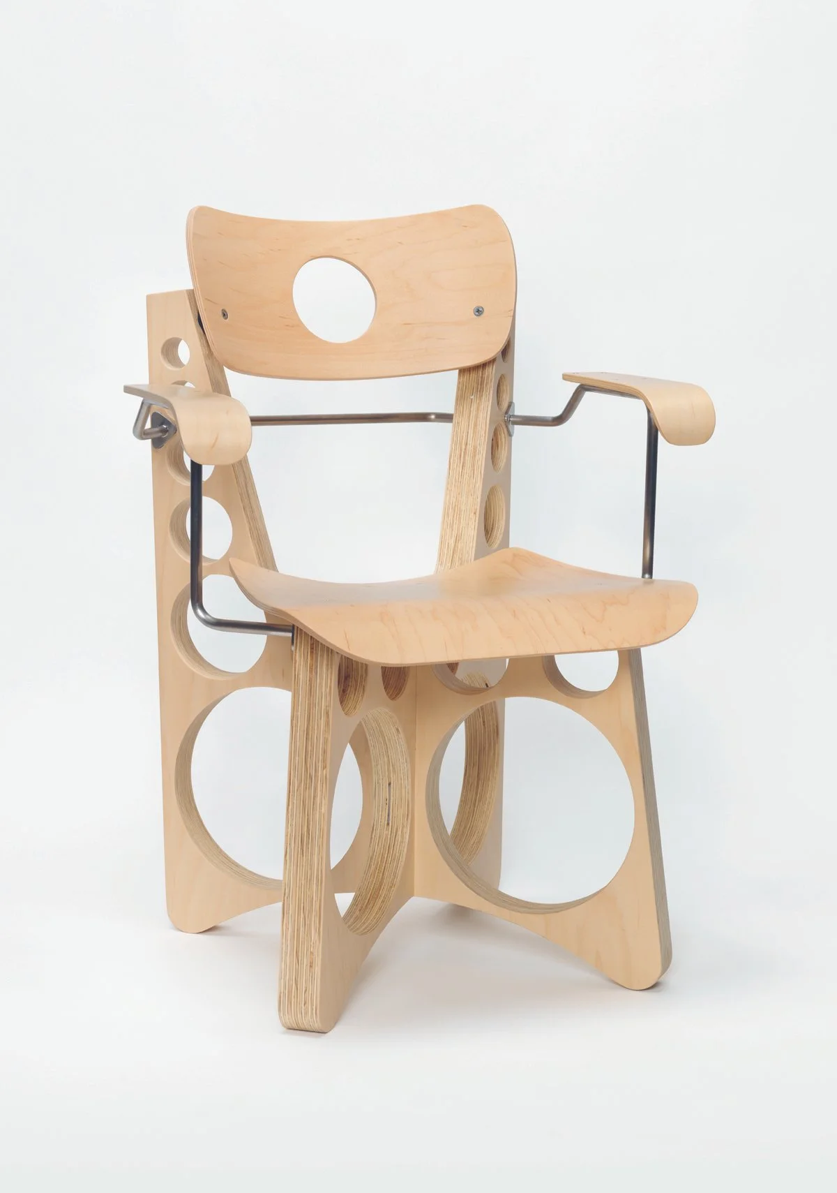  Tom Sachs,  Shop Chair with Arms , 2022. Artwork © Tom Sachs (page 197) Plywood, rubber flex-mounts, stainless steel, and stainless steel hardware; 33 1/2 × 24 × 18 1/2 in. 