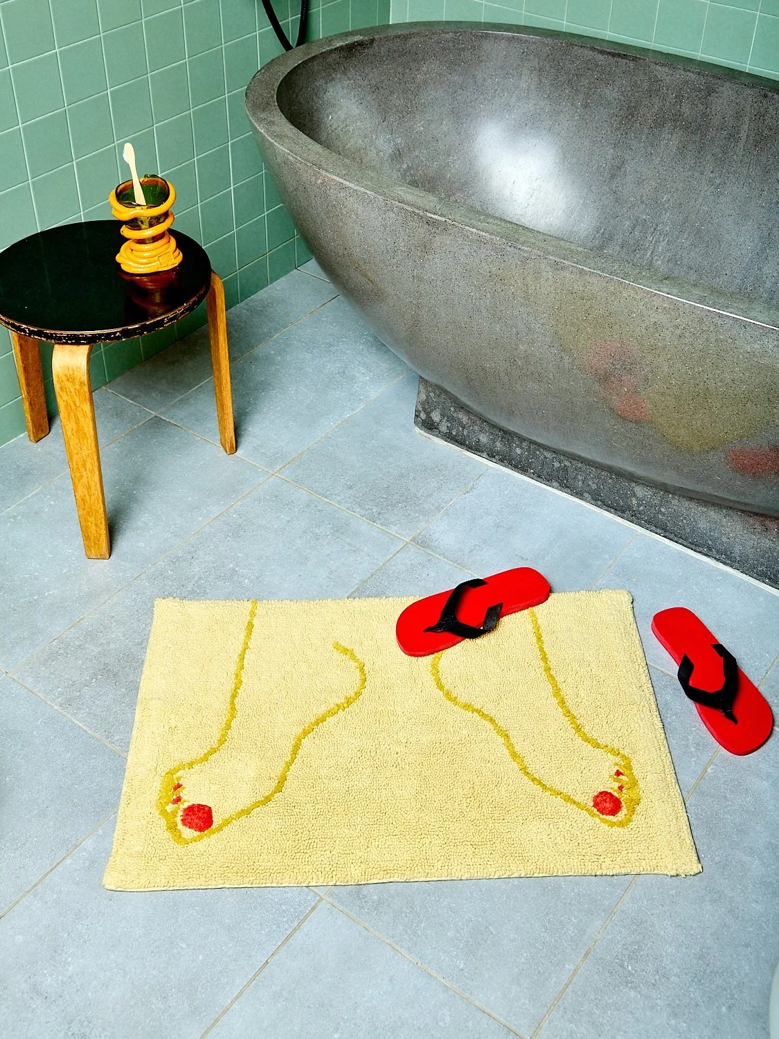  Footsie Bathmat in Yellow | Source: Coming Soon 