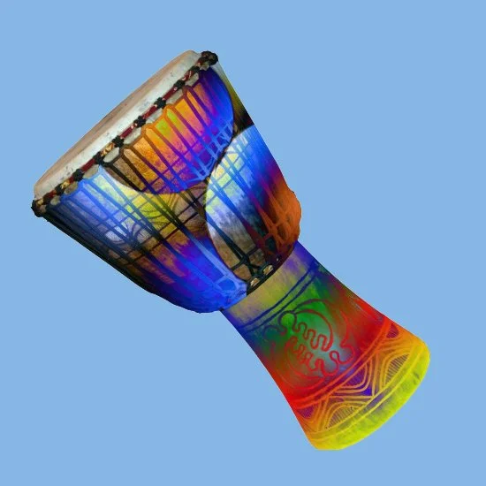 Colorful hand drum with tribal patterns on a light blue background.