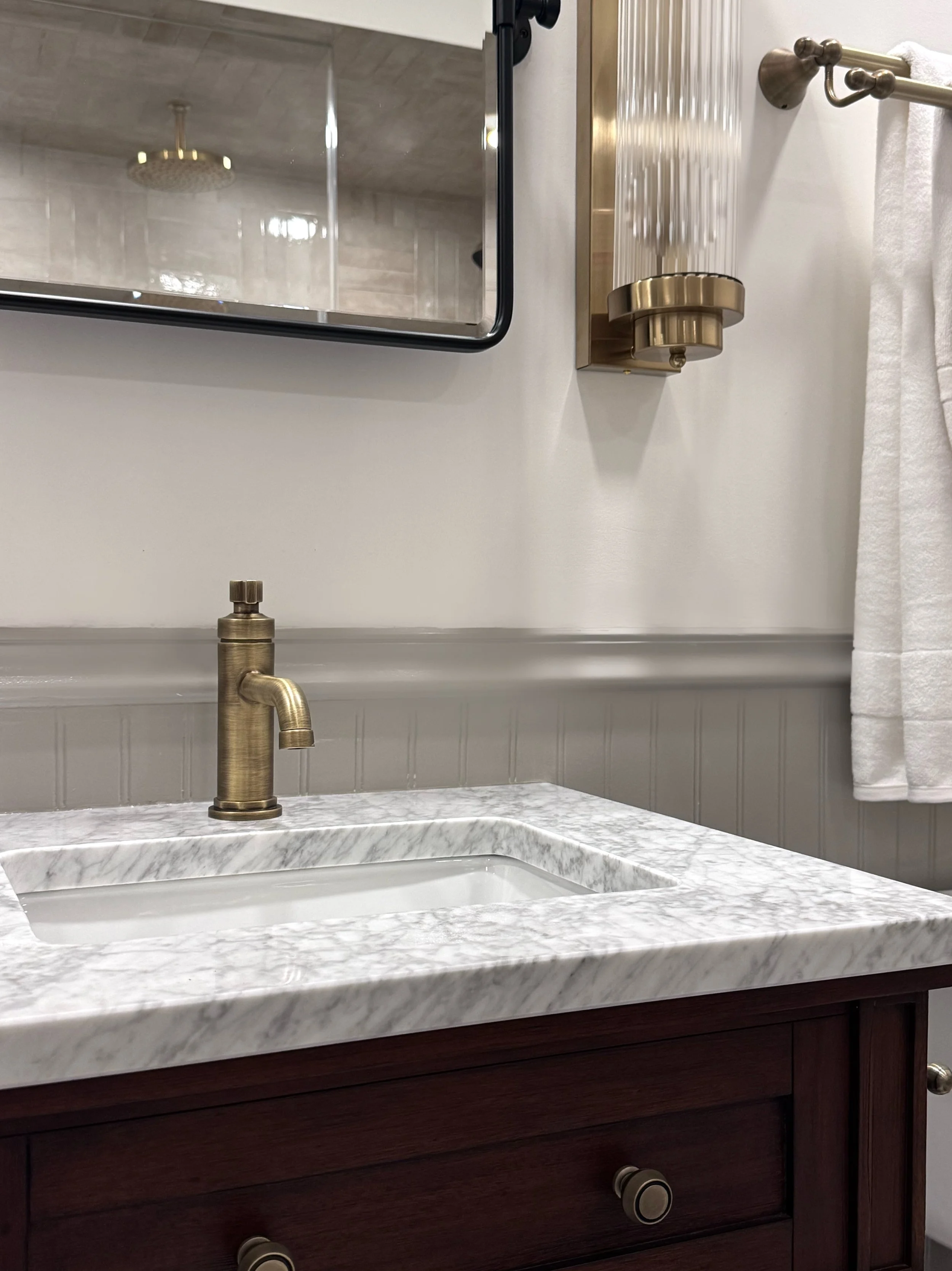 Faucet over a marble basin