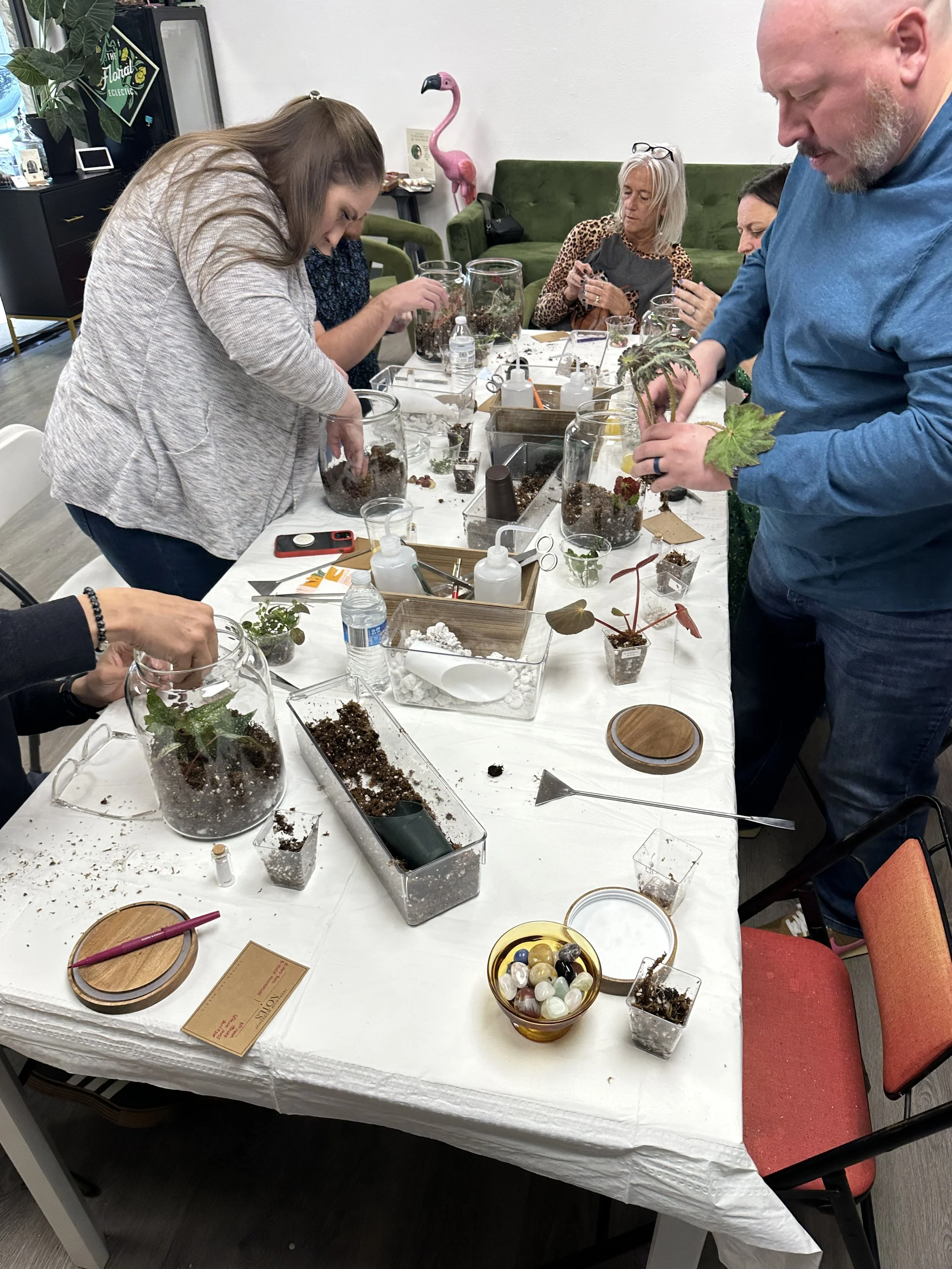 Guests creating terrariums during a private hands on terrarium workshop led by Lauren and Plants.