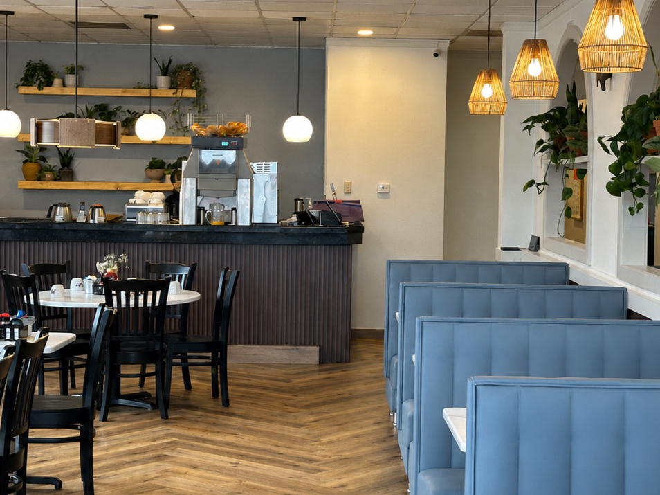 Restaurant interior plant design in Fort Worth featuring custom greenery, trailing pothos, and thoughtfully styled indoor plants.