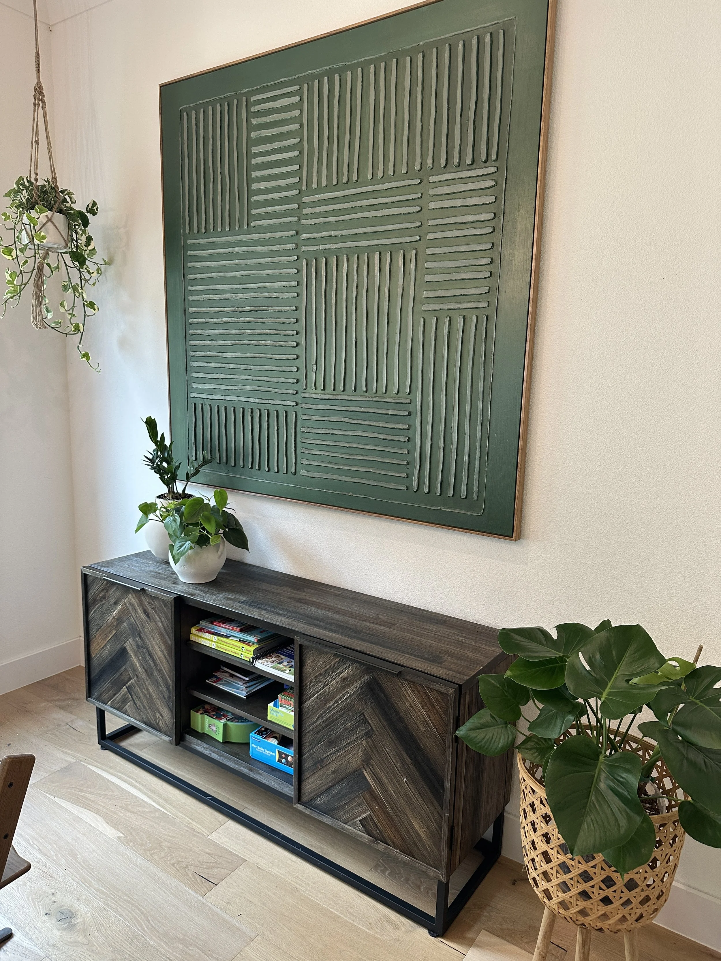 Styled interior plant design with monstera and modern furniture in Aledo home