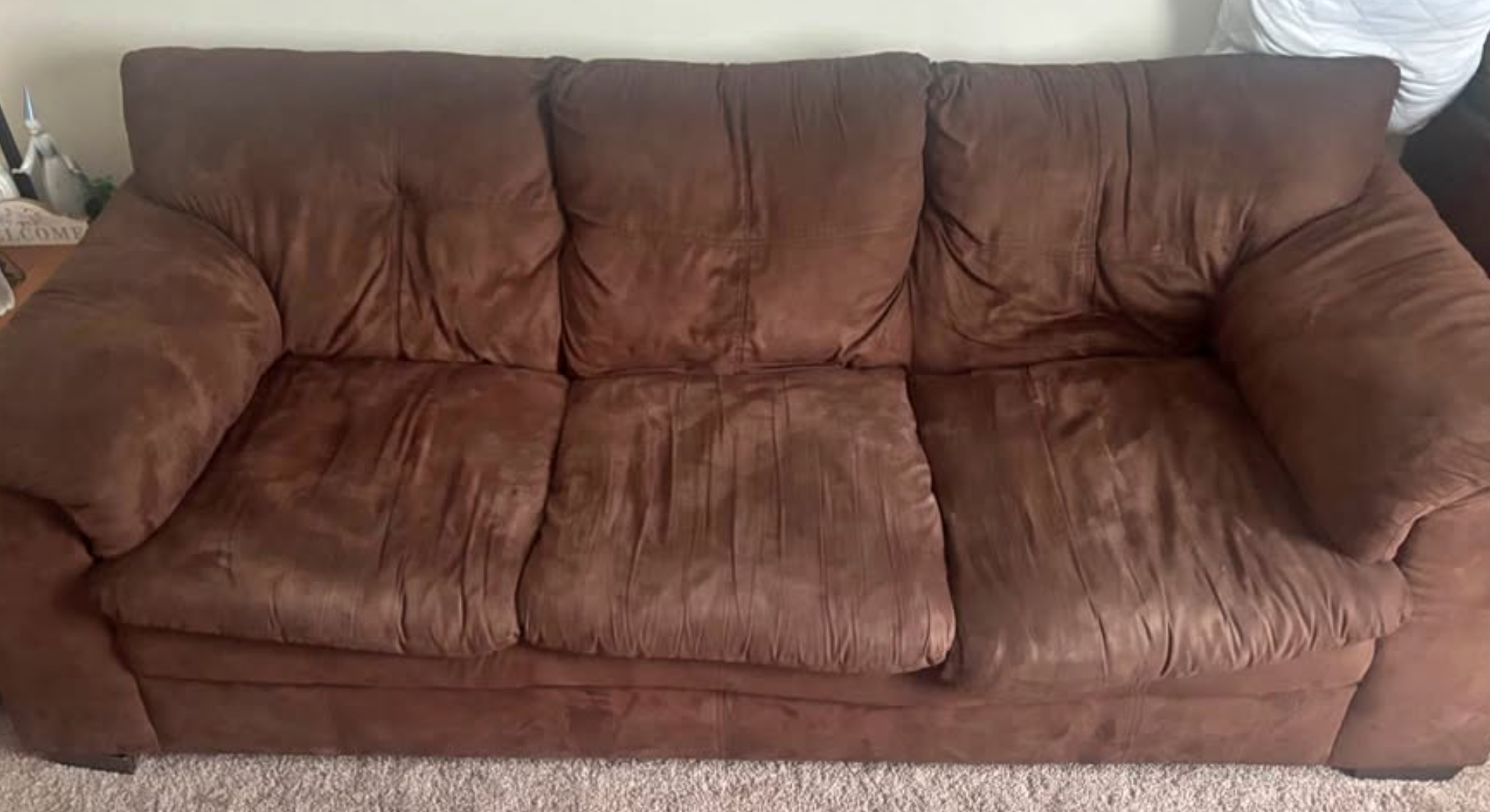 worn brown sofa before upholstery evaluation at Inlow Upholstery in Lawndale, NC