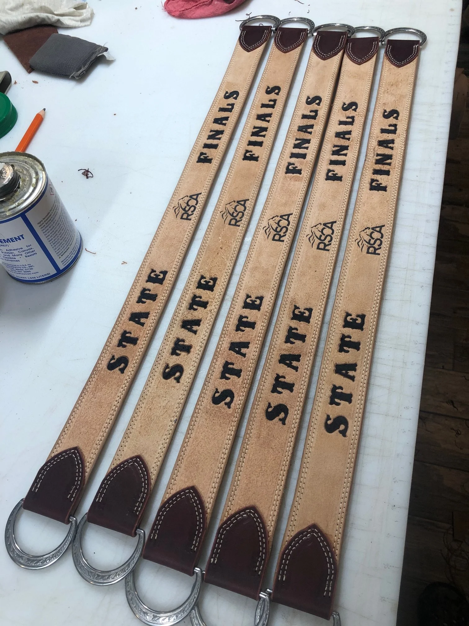 Five leather  tripping collars