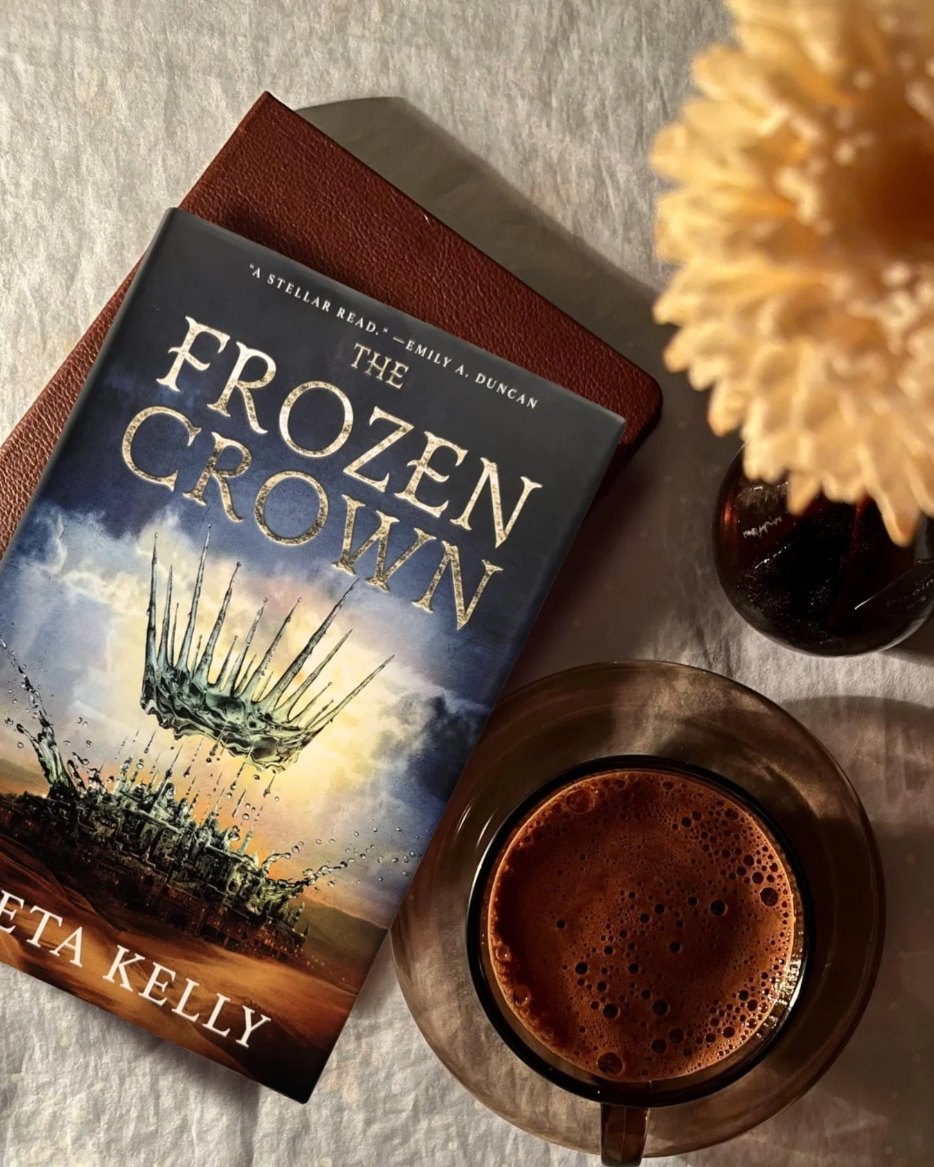 Is there anything better than a fresh cup of coffee and a complete series?

The Frozen Crown is book one in a complete romantasy duology available to binge right now on kindle unlimited! 

What&rsquo;s inside:
* 🗡️ FMC
* She can see ghosts
* Court p