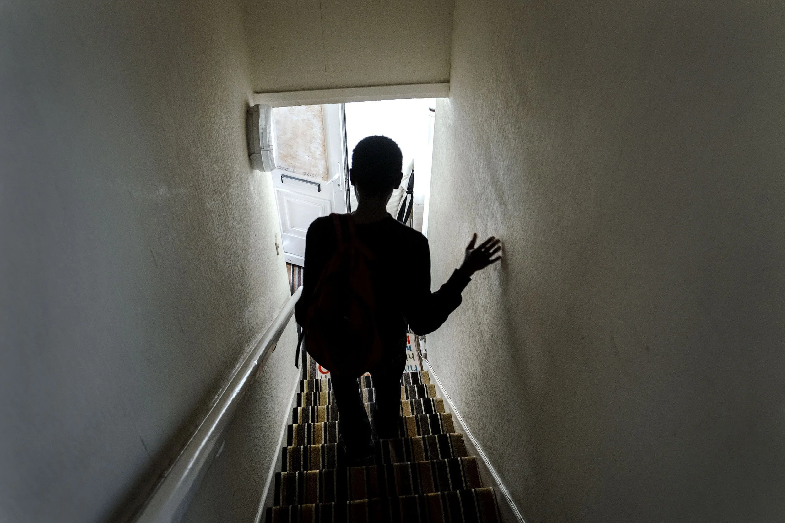 Gift on his way out after dropping off his bag of food from the food-bank of the Elim Community Church in West Bromwich, England.