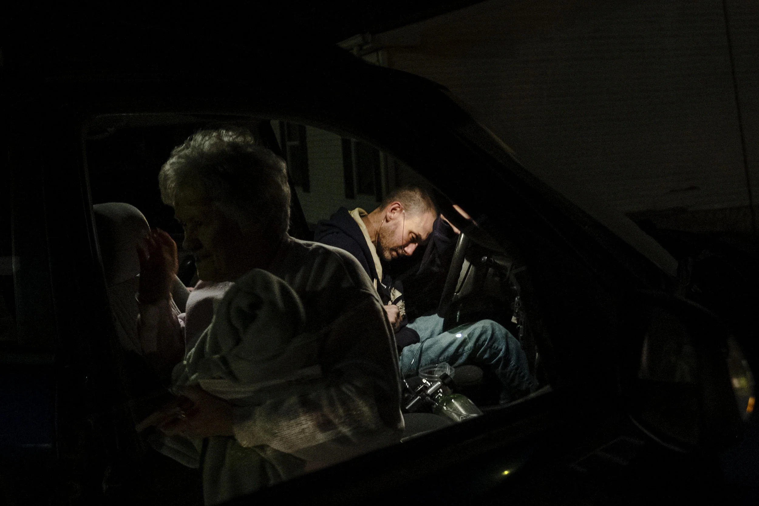 Glenn drops off his mother at her home in Sookeys Creek, Kentucky. 