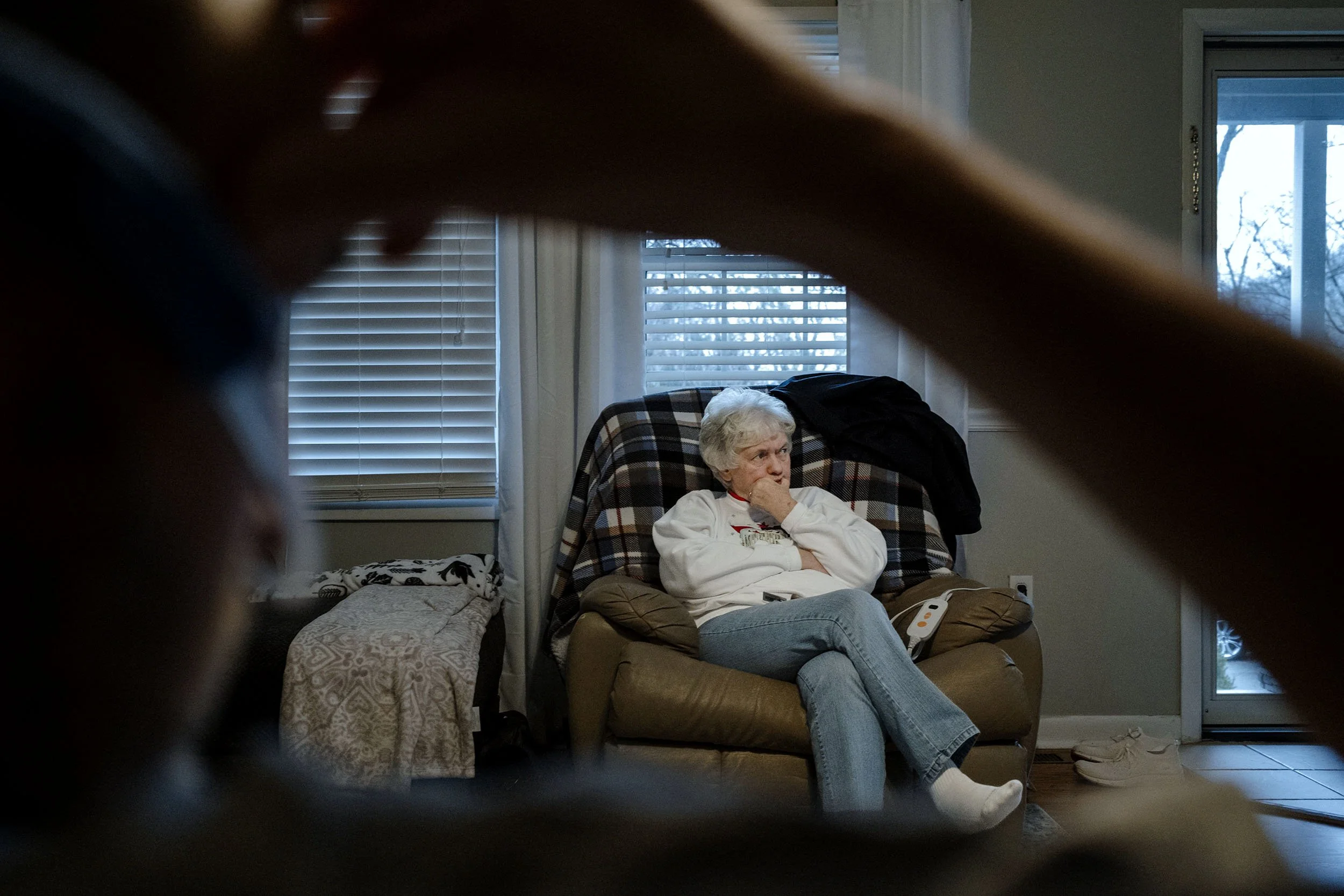 Glenn and his mother watching TV together. Robinson Creek, Kentucky. 