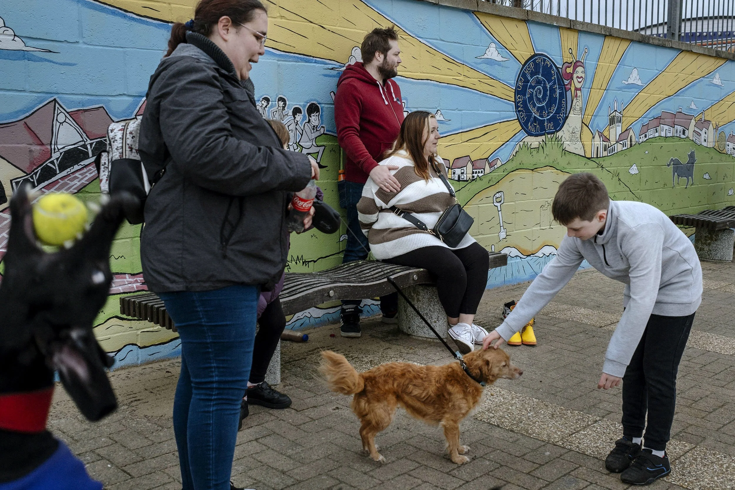 Dogs and their owners get together near the seafront in Great Yarmouth, England.