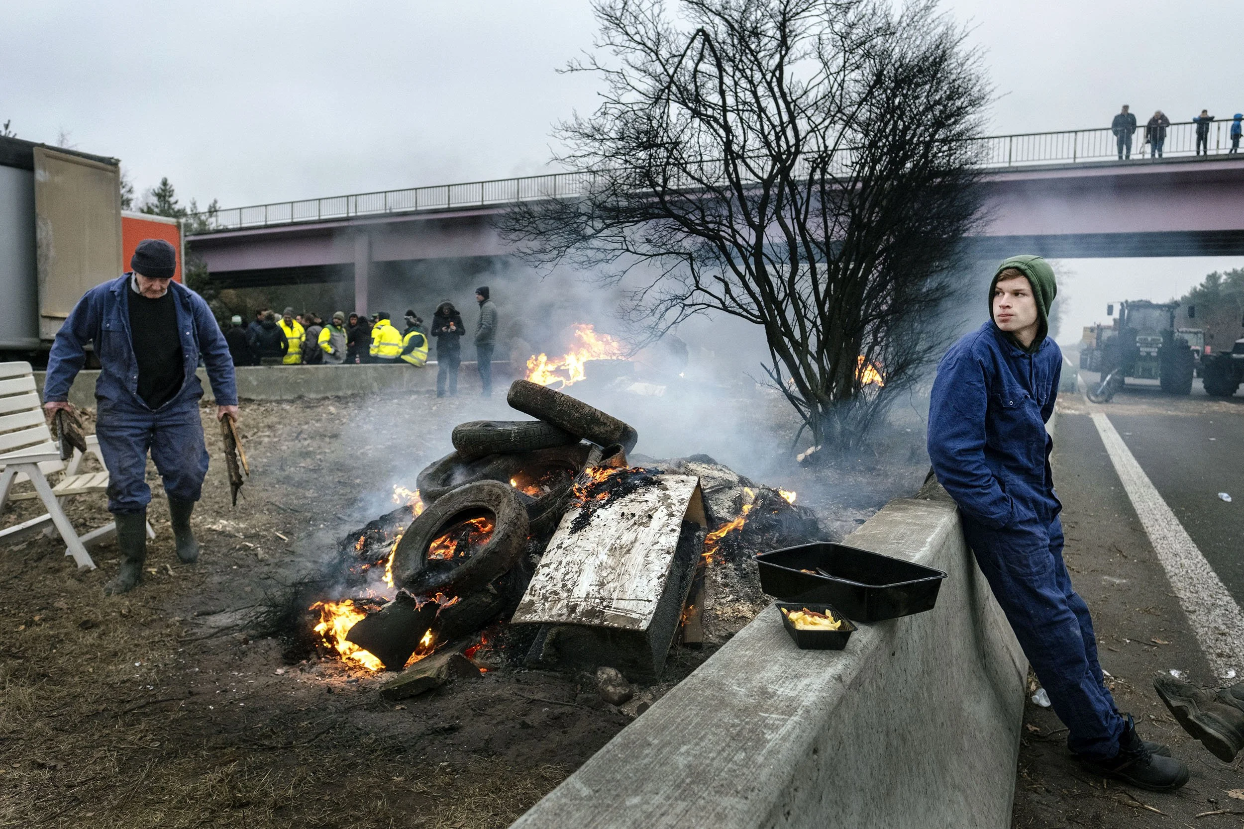 Angry farmers block a major motorway near the Dutch border. Mol, Belgium.