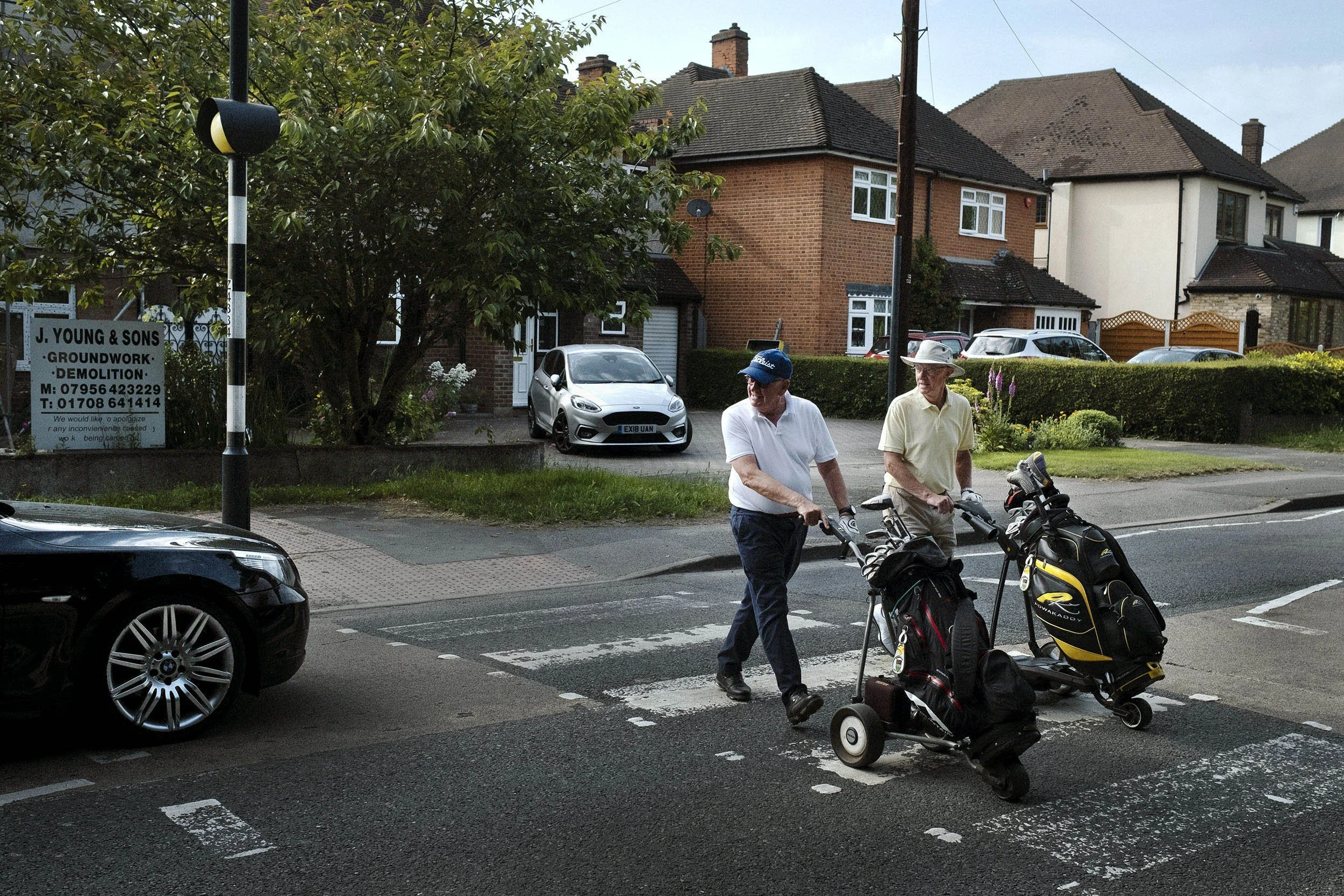 The golfers cross the road to reach the other half of the golf-course. Havering had a 70% Leave vote during the 2016 Brexit referendum.