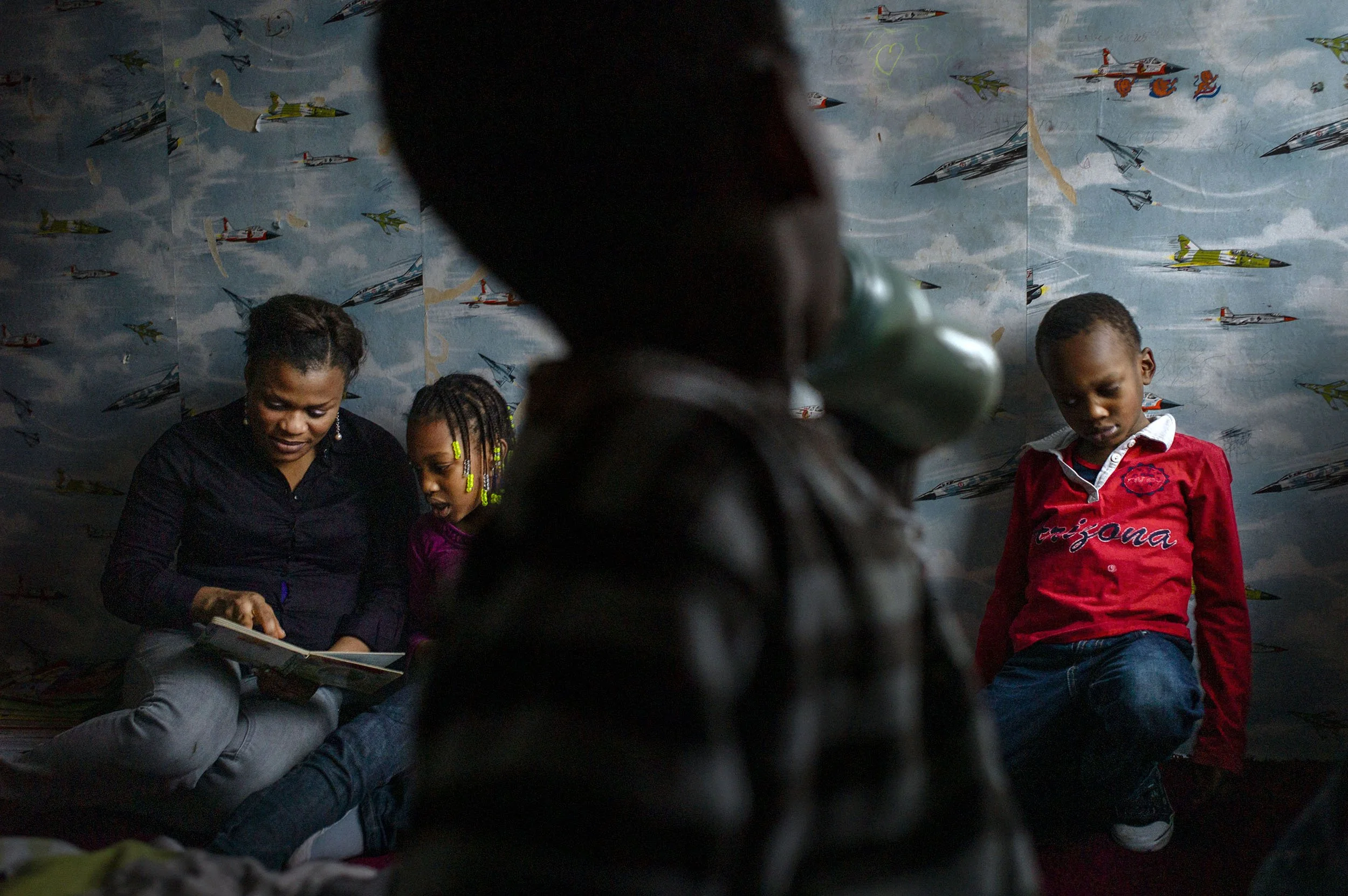Faith is a refugee from Sierra Leone, and she lives with her 3 children in one small room. Rotterdam, the Netherlands.