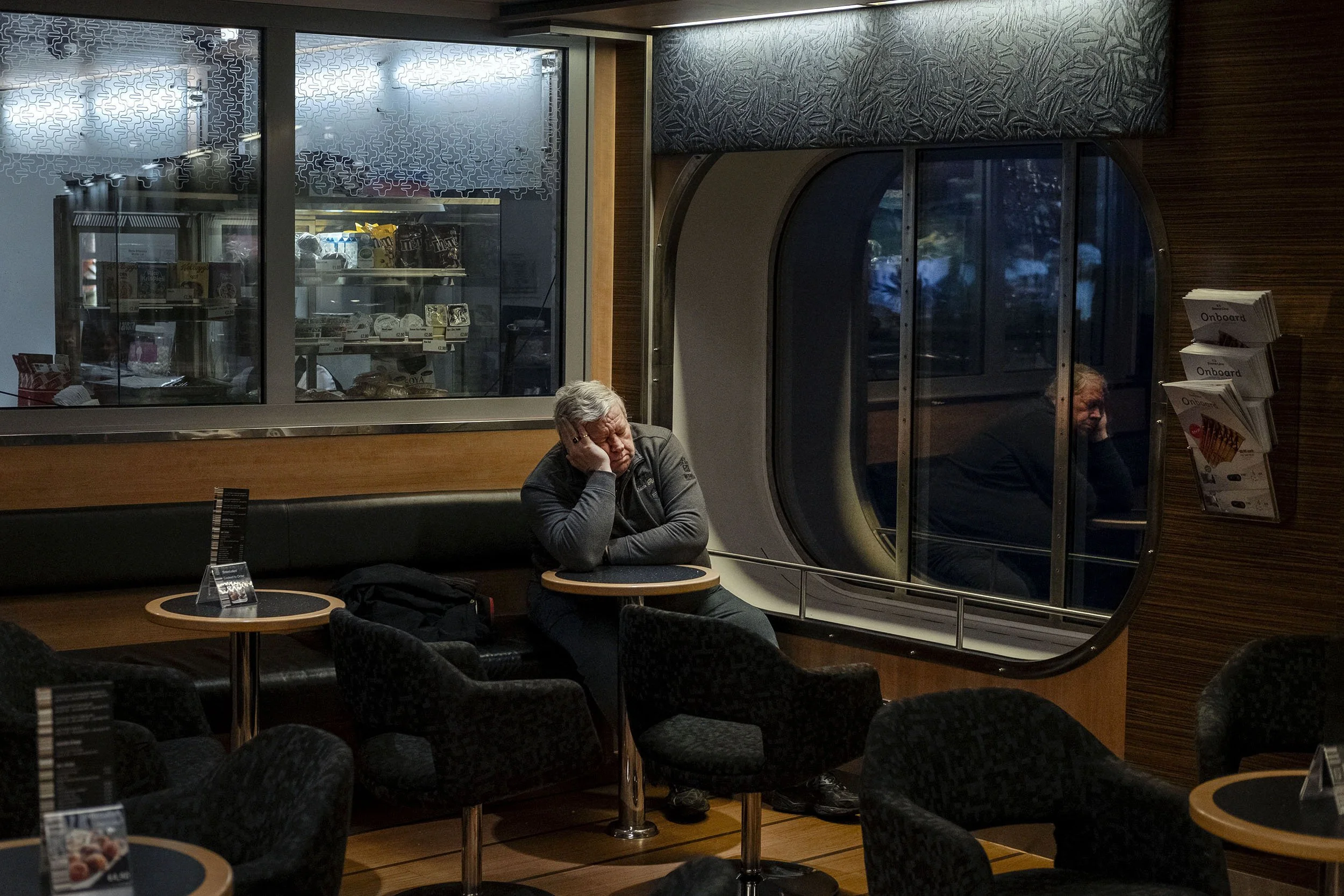 A truck driver takes a nap on the ferry from Rotterdam to Hull.