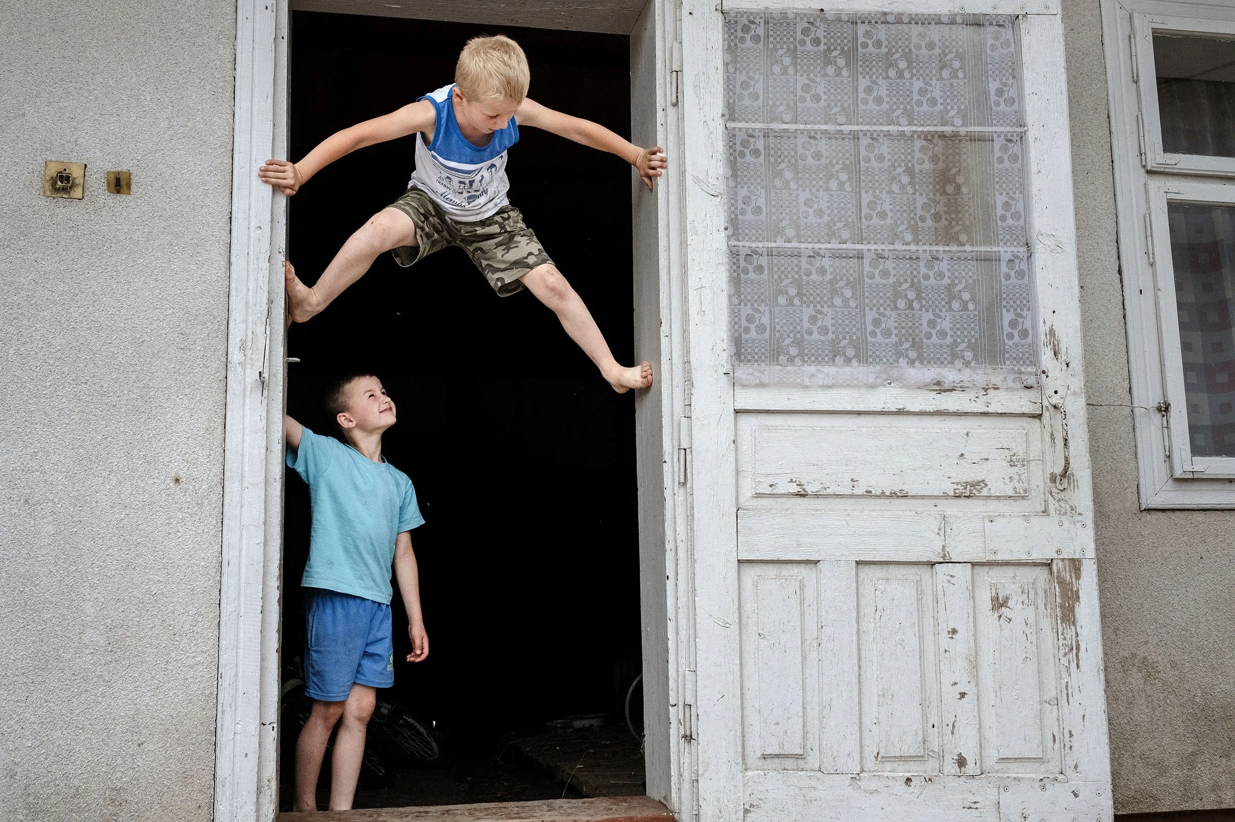 Stasic plays with his best friend at his grandfathers house.
