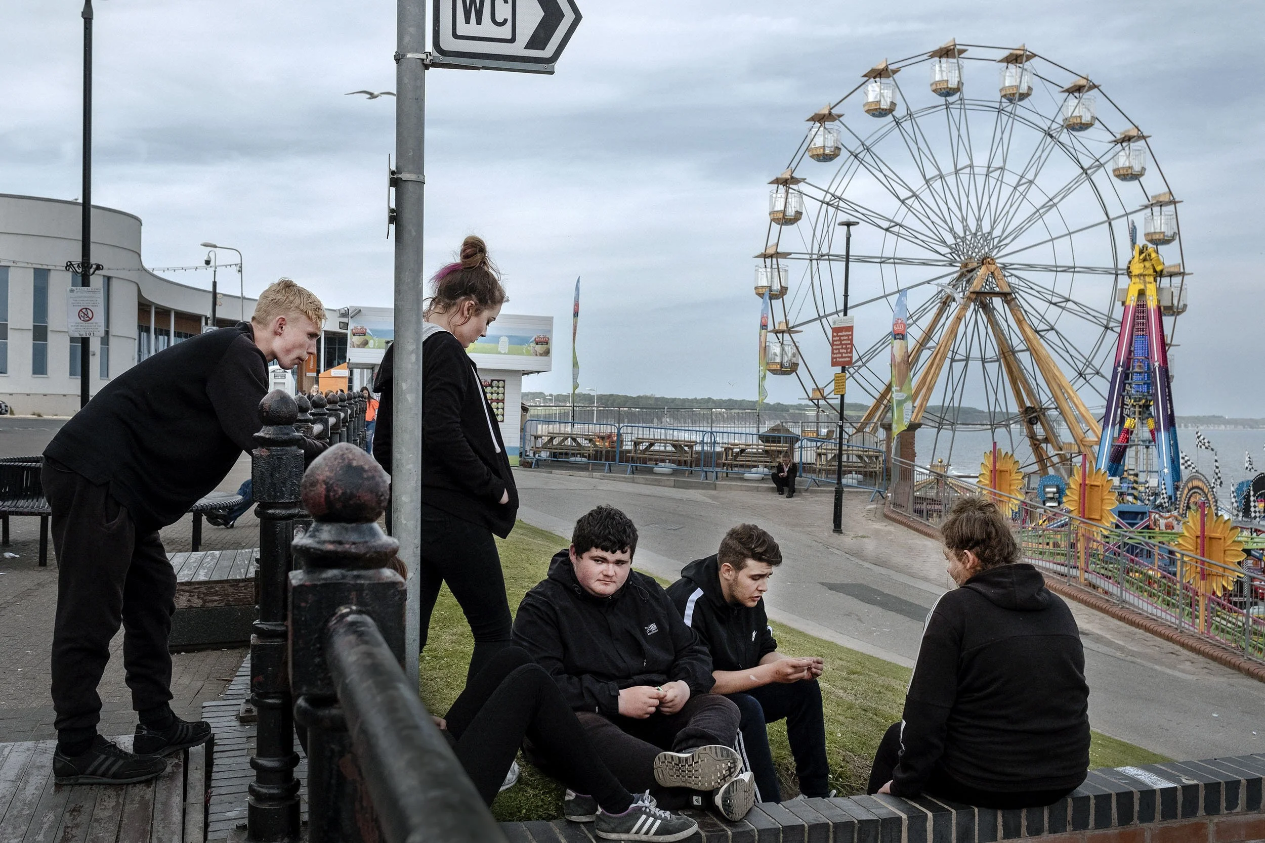 Youth dressed in black which is sad to say but it could be likely also the colour of their future, Bridlington, England.