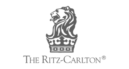 Logo of The Ritz-Carlton featuring a lion's head on a crown