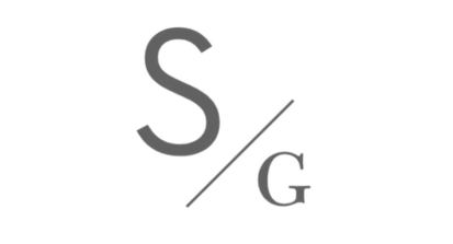 A symbol with a large letter S above a slash and a smaller letter G underneath.