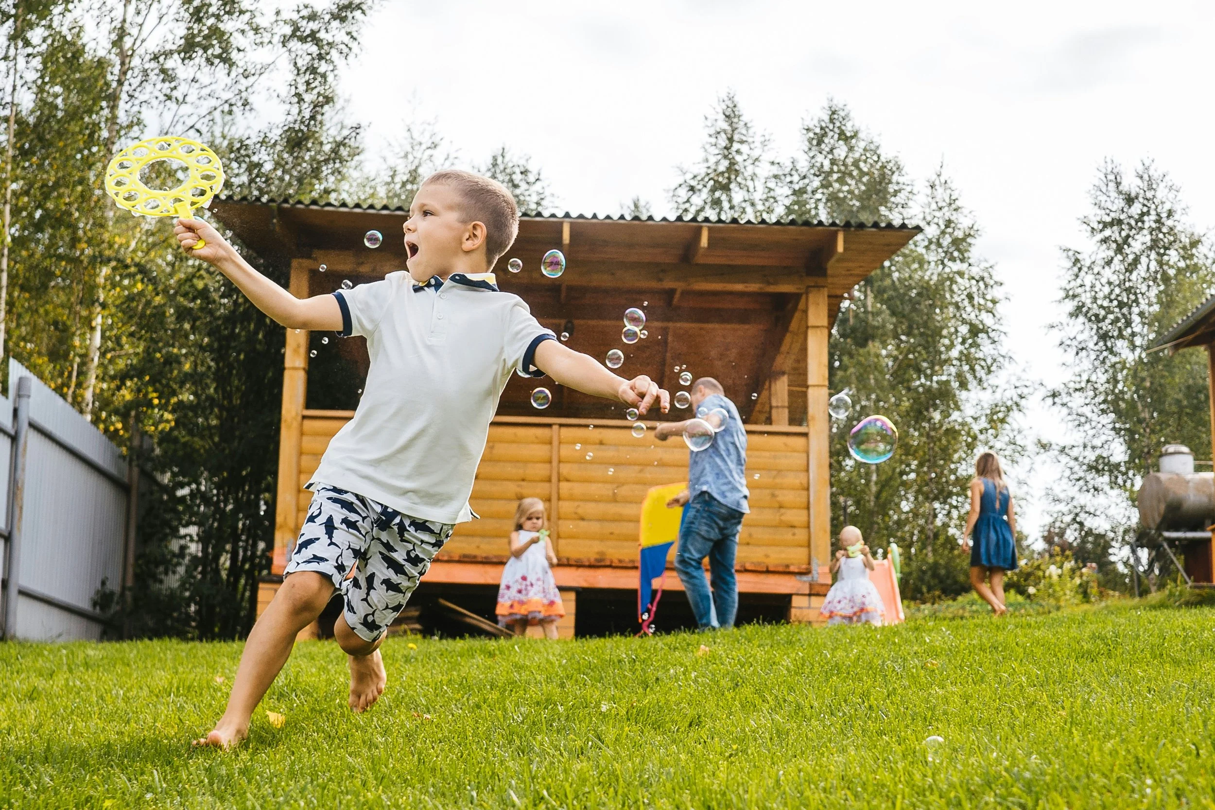 happy boy playing outside, mosquito control, pest control in tampa