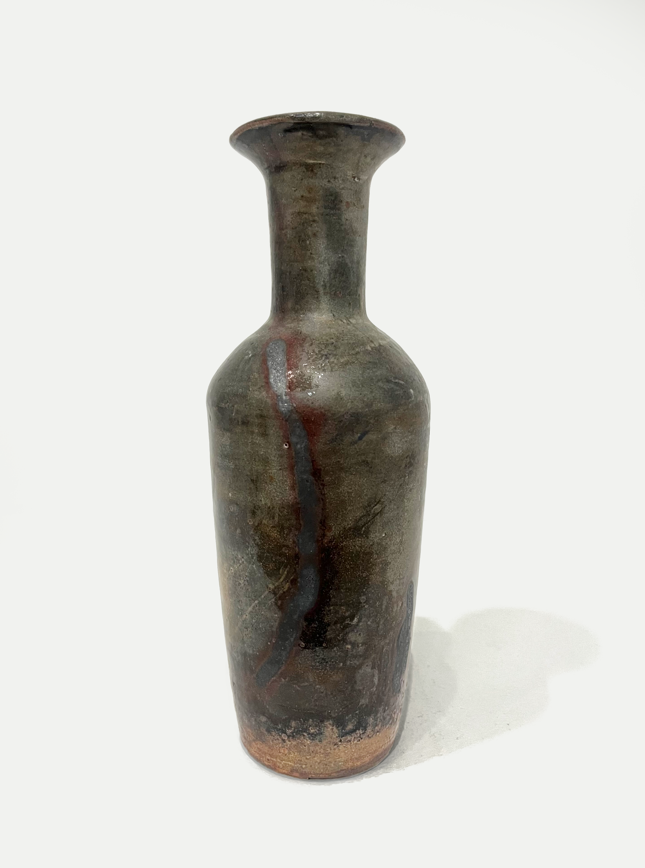 2025

shino and copper wash glaze vase
manual reduction

4 x 12