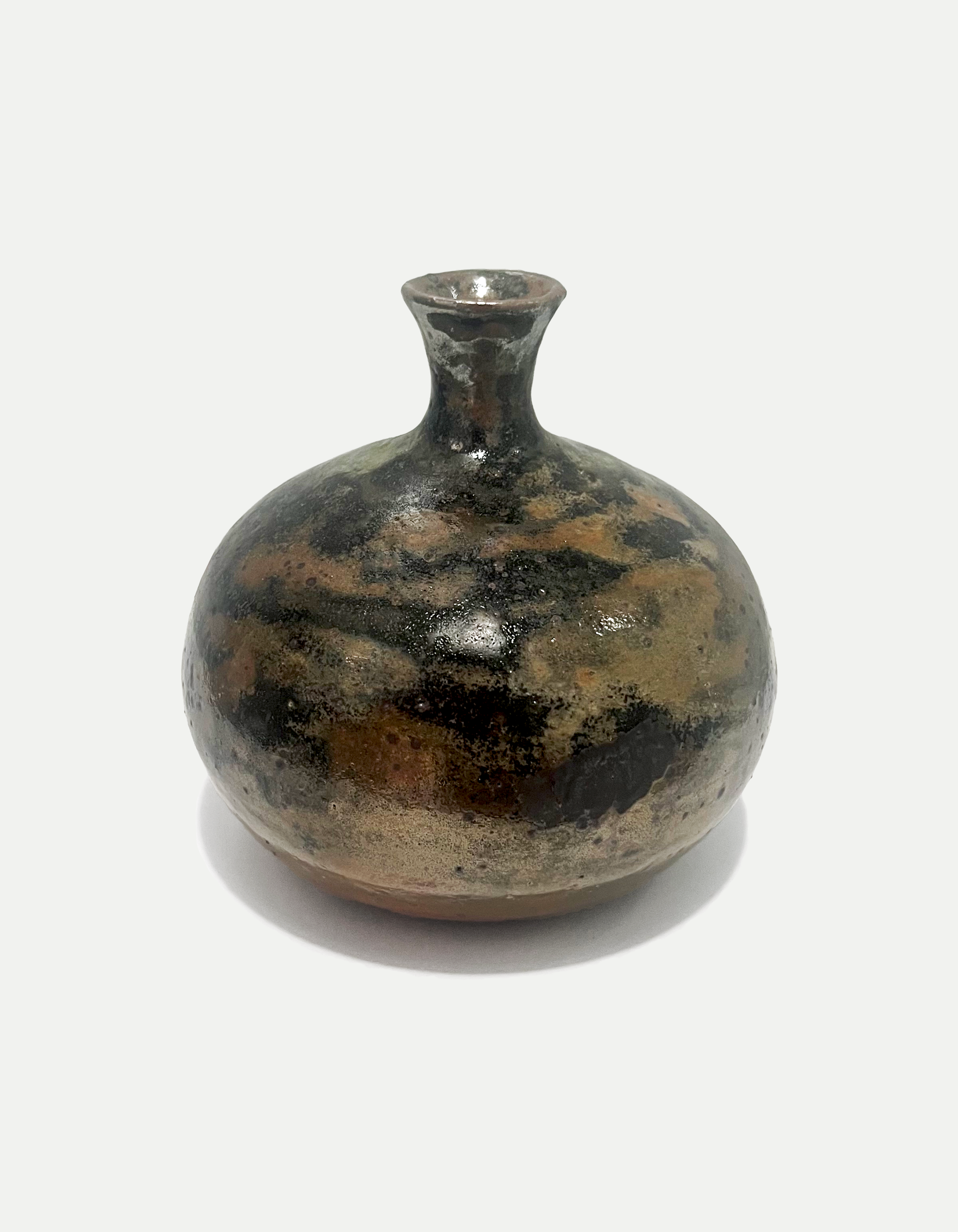 2024

shino and celadon glaze with iron wash vase
reduction

5 x 6