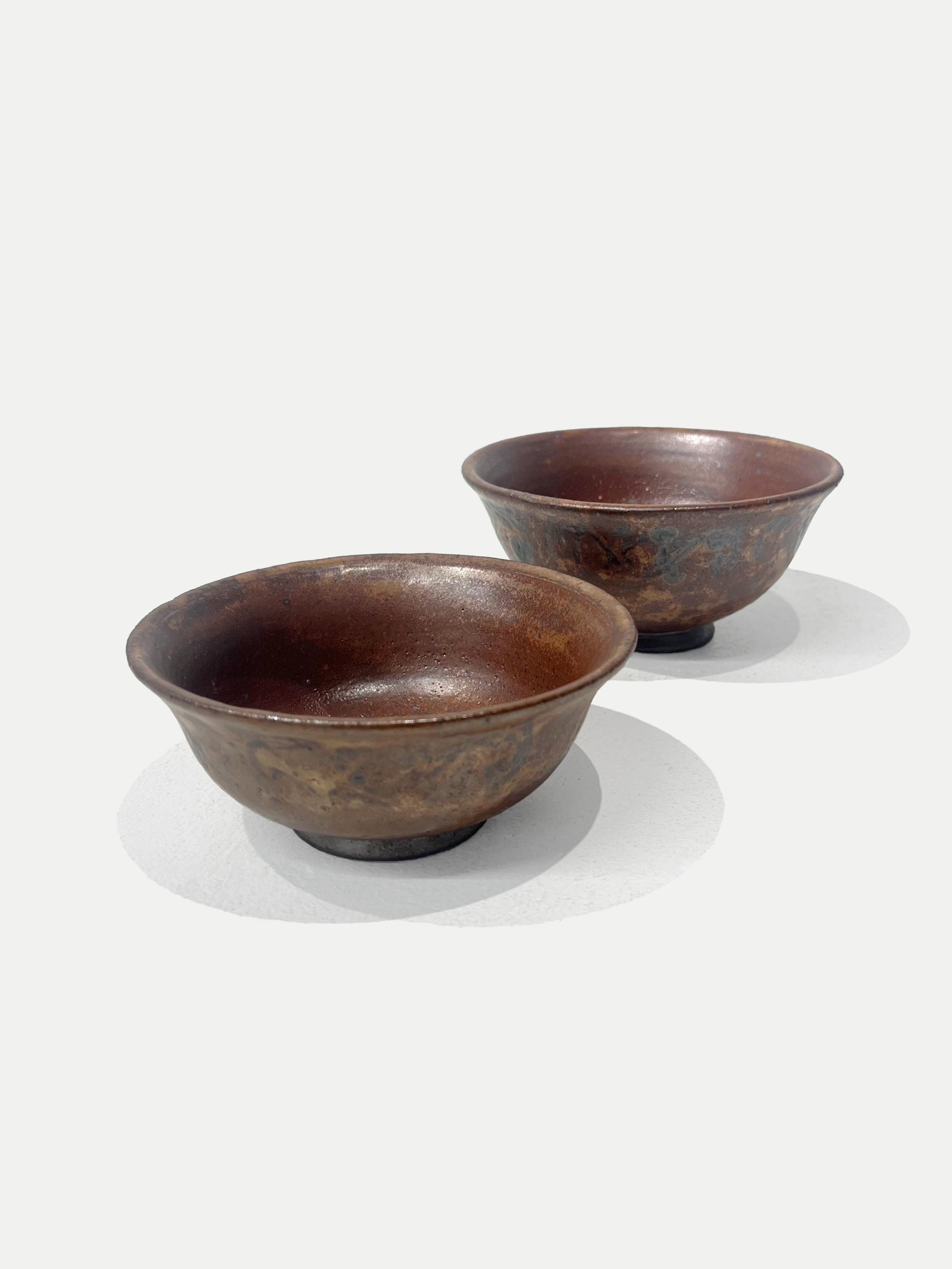 2025

shino glaze with iron wash design bowls in reduction

6 x 4