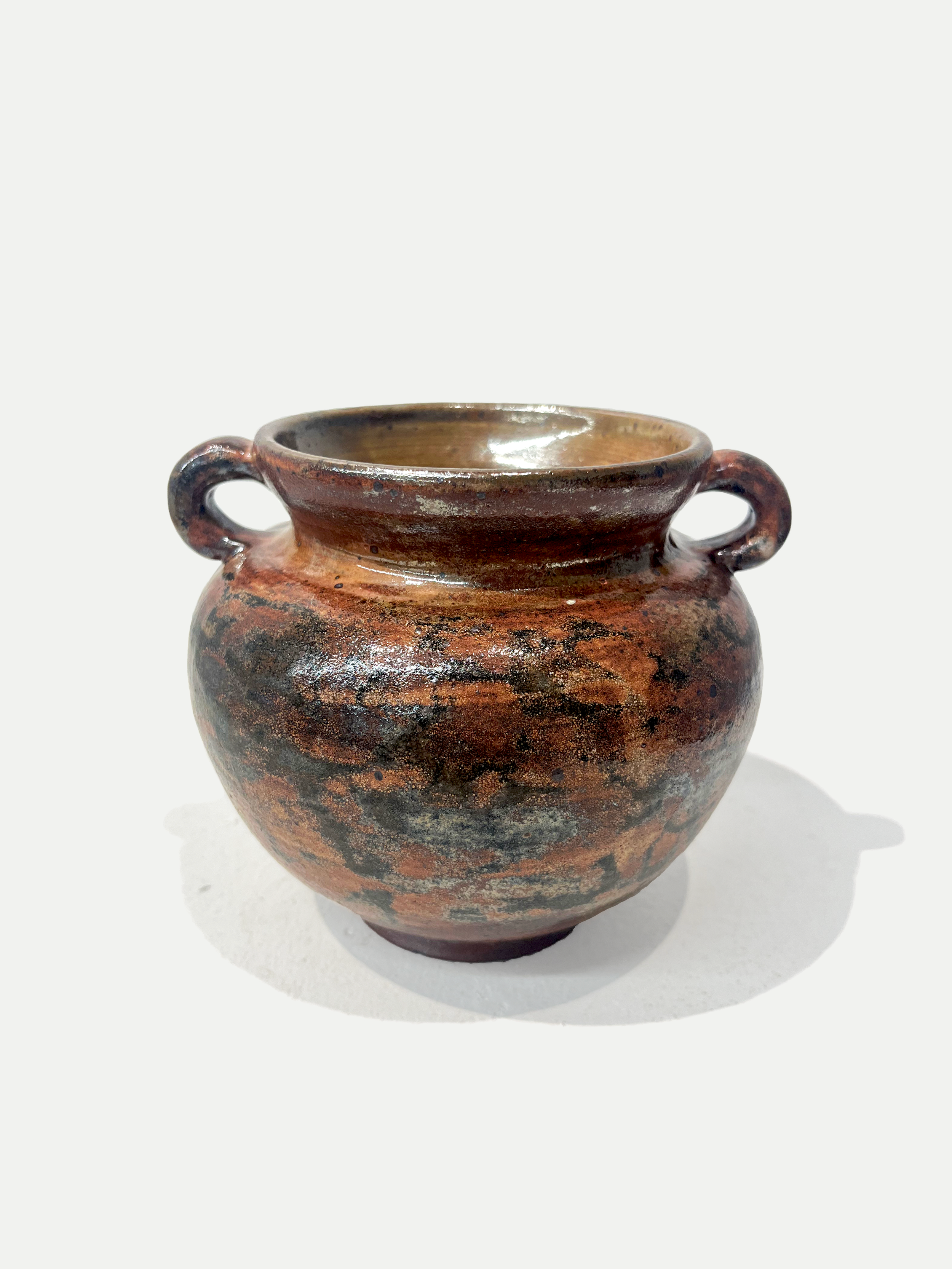 2025

shino and iron wash glaze over white slipped pot
reduction

6 x 6
