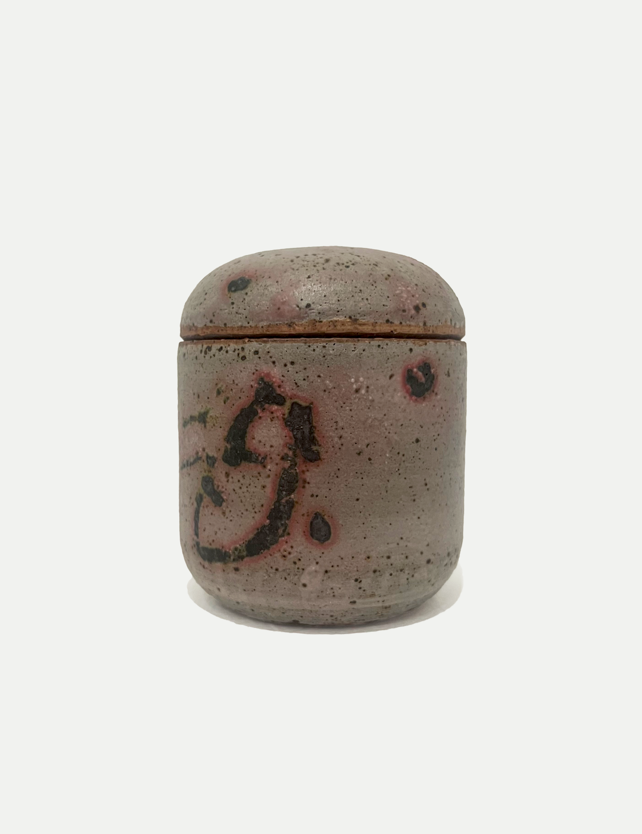2025

wood ash glaze with copper was disign lidded jar
reduction

3 x 4