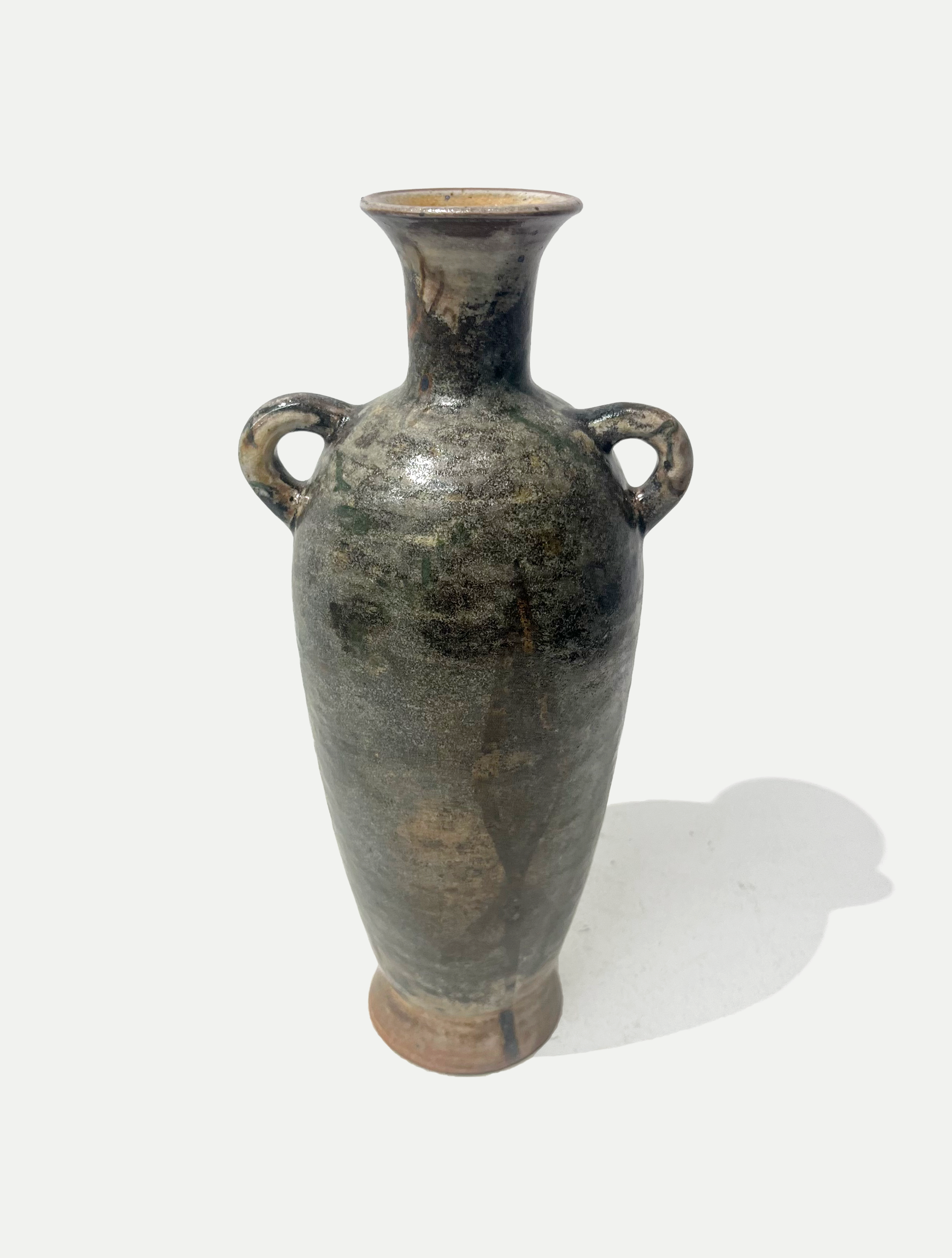 2025

shino and iron wash glaze vase 
reduction

5 x 12