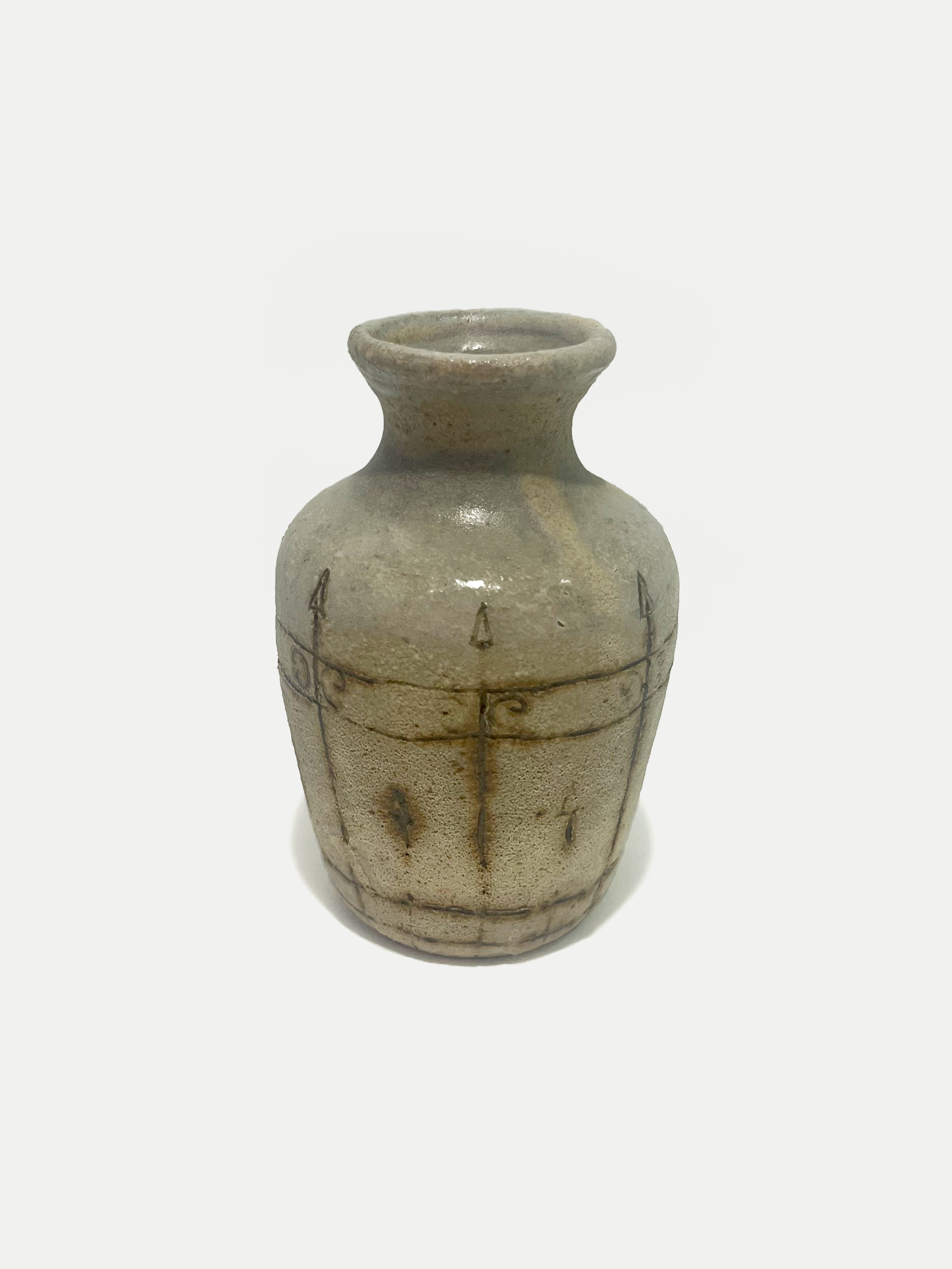 2024

wood ash glaze with iron-washed sgraffito fence design vase
reduction

2 x 5