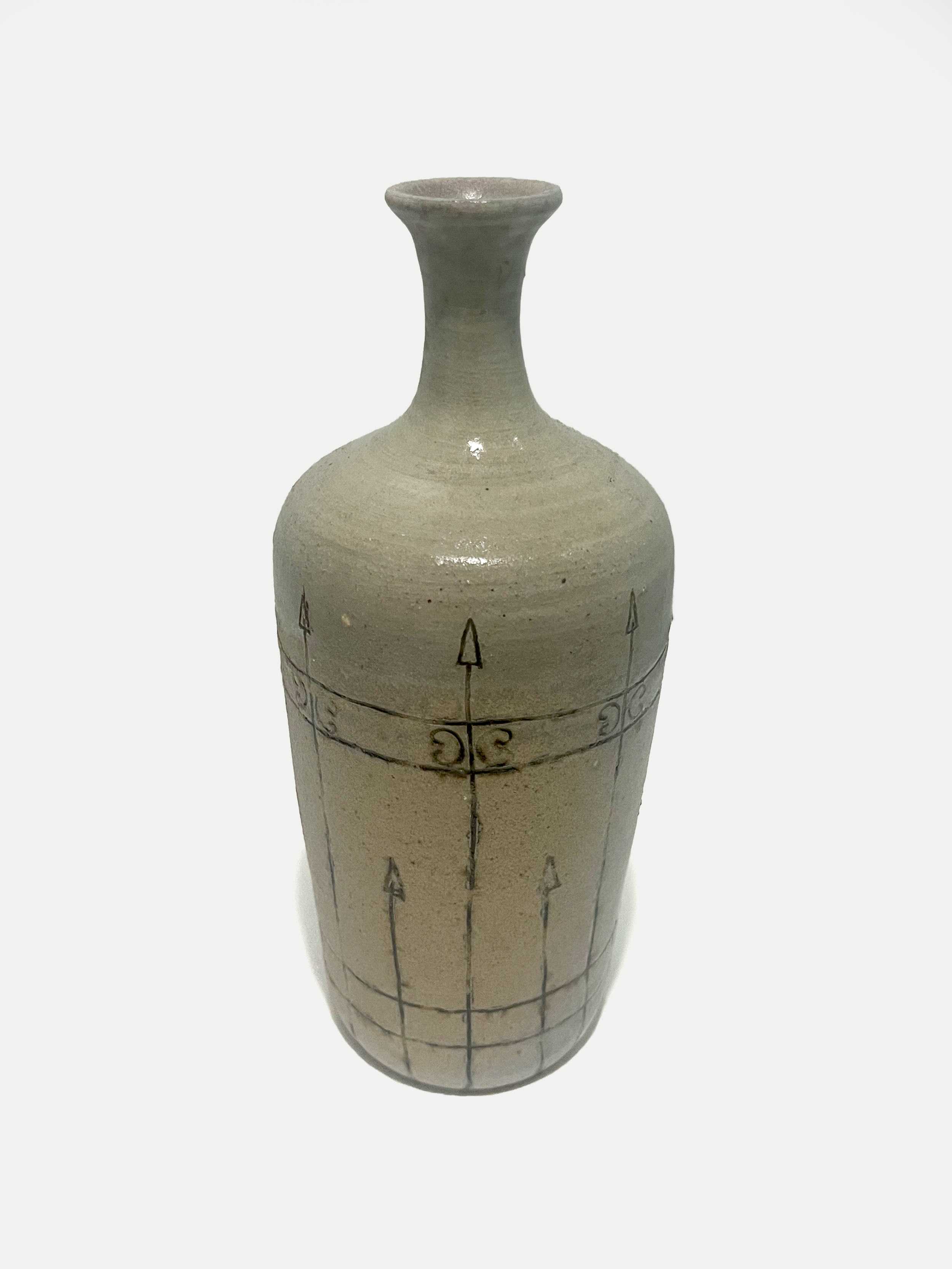 2024

wood ash glaze with iron-washed sgraffito fence design vase
reduction

4 x 7