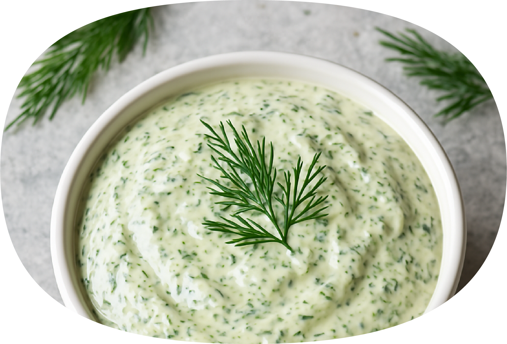 Molho de dill com salsinha em uma tigela branca, decorado com ramos de dill