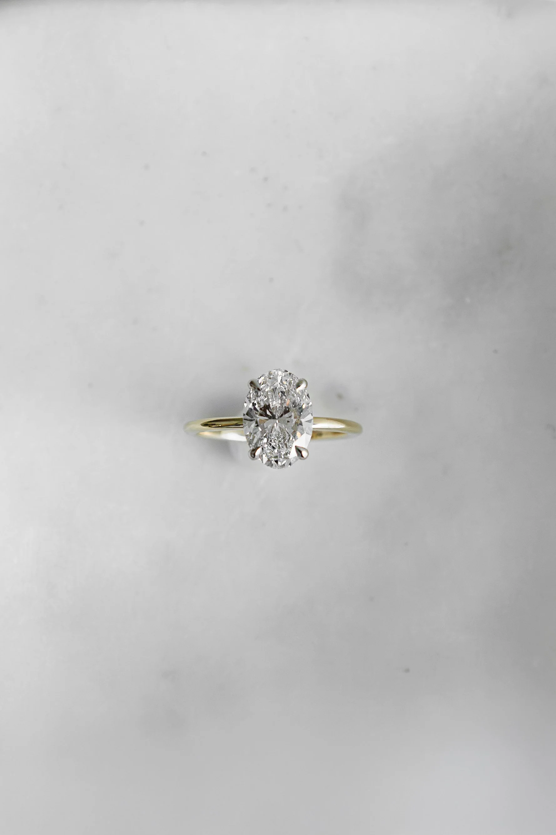 Oval with Hidden Halo Engagement Ring