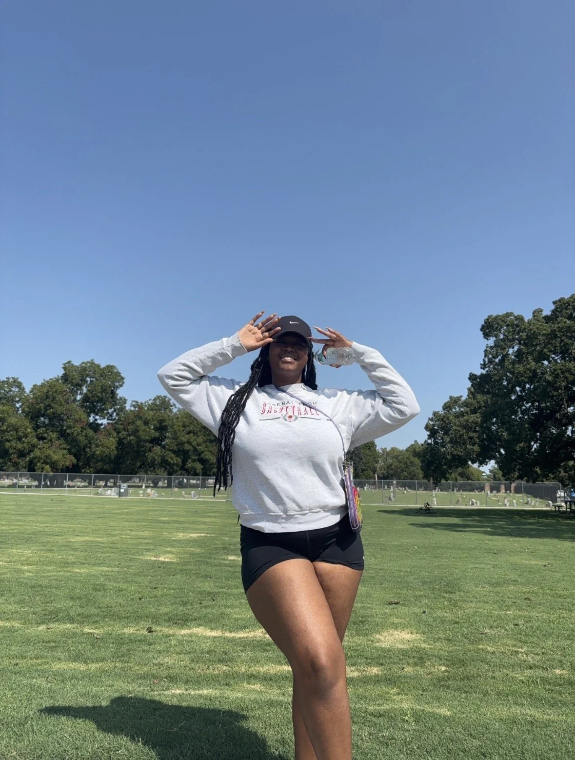 Kenya Brown taking a moment to capture a day of fitness. Walking around Denton and appreciating the sunshine, green grass and treas before winter.