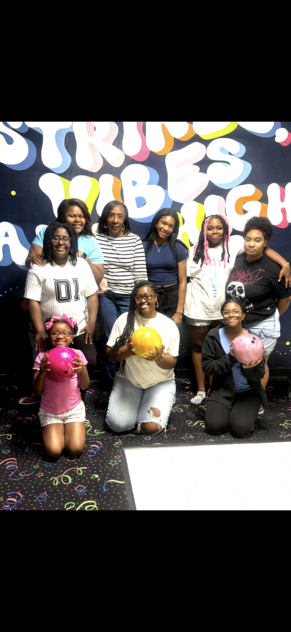 Kenya Brown with her amazing Women Of Praise group full of various girls who praise dance at Saint Emmanuel Baptist Church. With a cheerful outing at a local bowling alley.