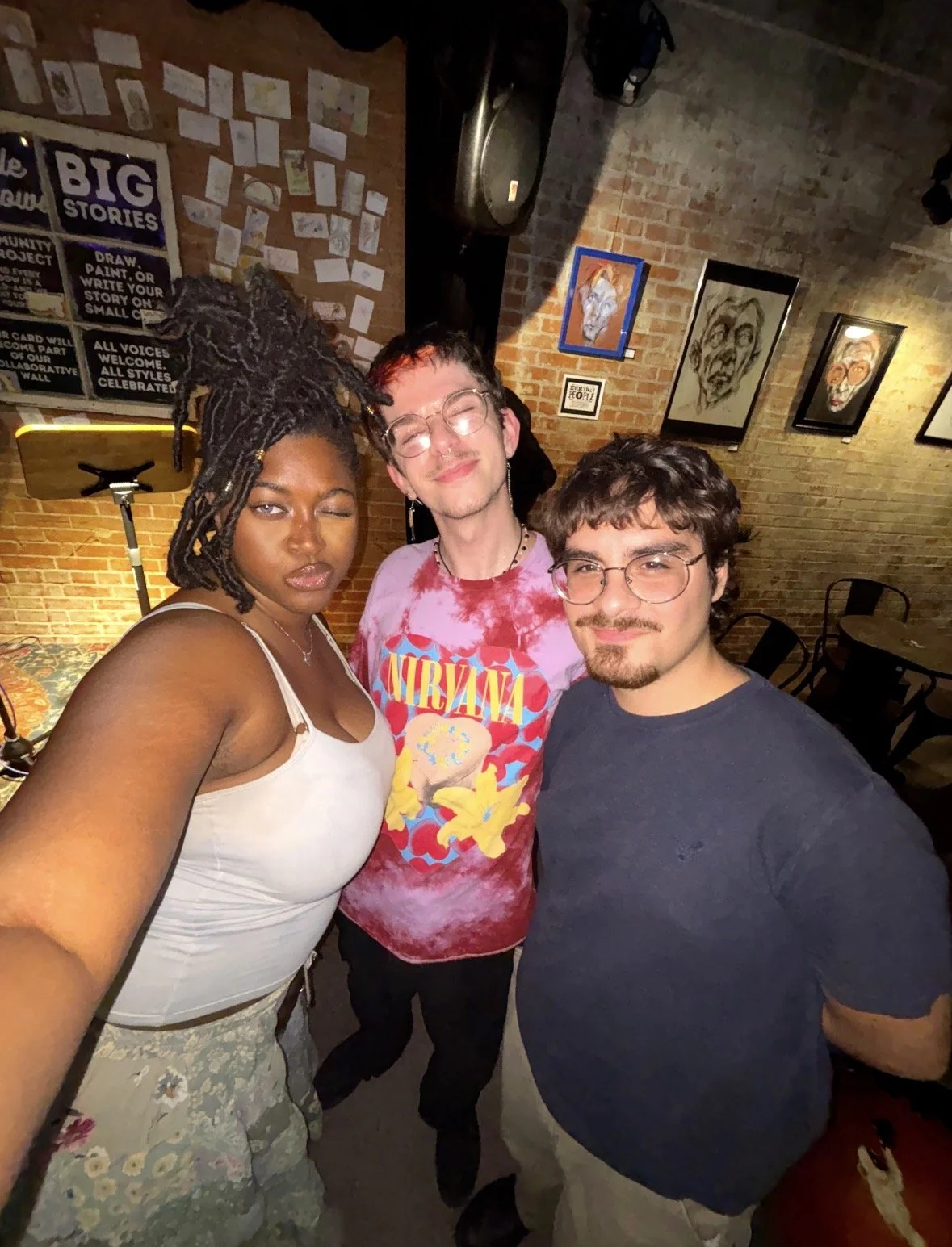 Local Artist Kenya Brown from Texas shares a photo with friends after a poetry night at Bramblitt's Yellow Dog Art Bar & Gallery! Grab a cocktail & get inspired to create art and recite poetry. 