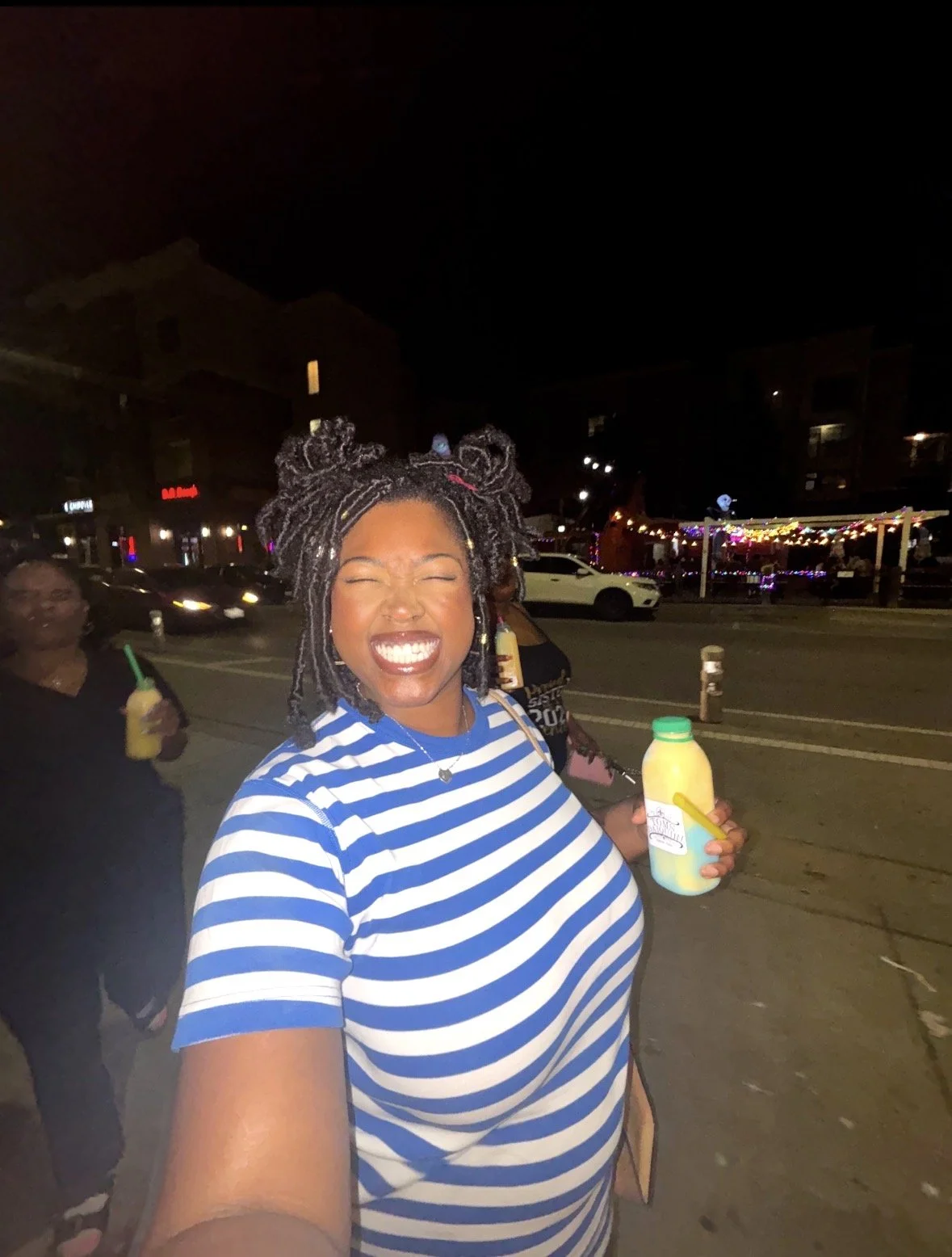 Kenya Brown out on Fry Street at  Toms Daiquiri Place, the top bar on Fry Street in Denton Enjoying a Blue Dream and Pineapple flavor. One bottle will get you tipsy.