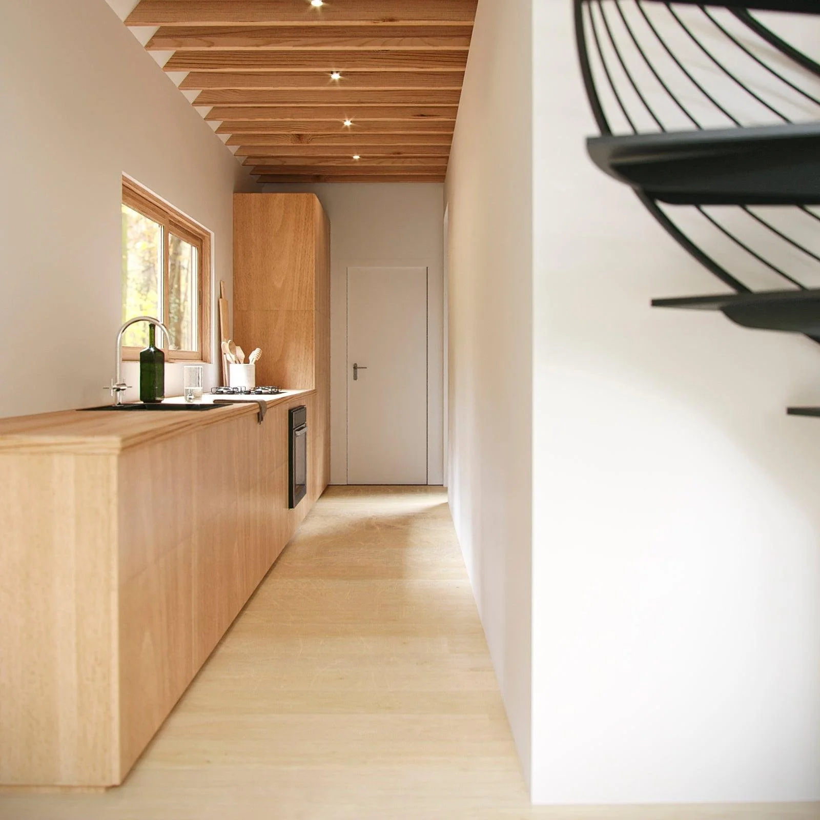 Minimalist kitchen with wooden cabinetry, a window, and a ceiling with wooden beams and recessed lights.