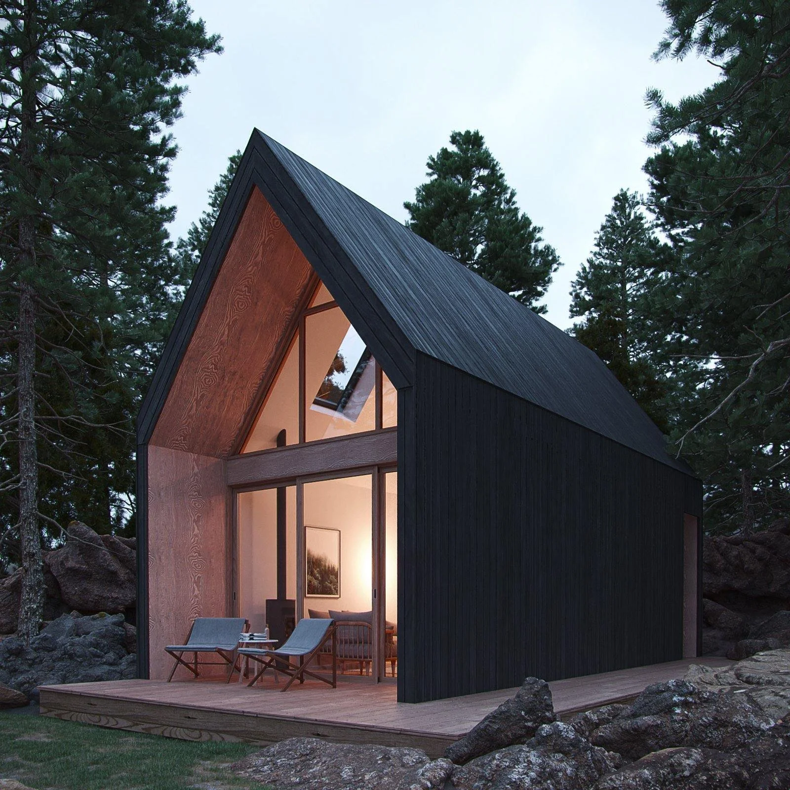 A modern A-frame cabin made of dark vertical wood panels with a large glass front and a wooden deck sitting among trees at dusk, with interior lighting illuminating the inside.