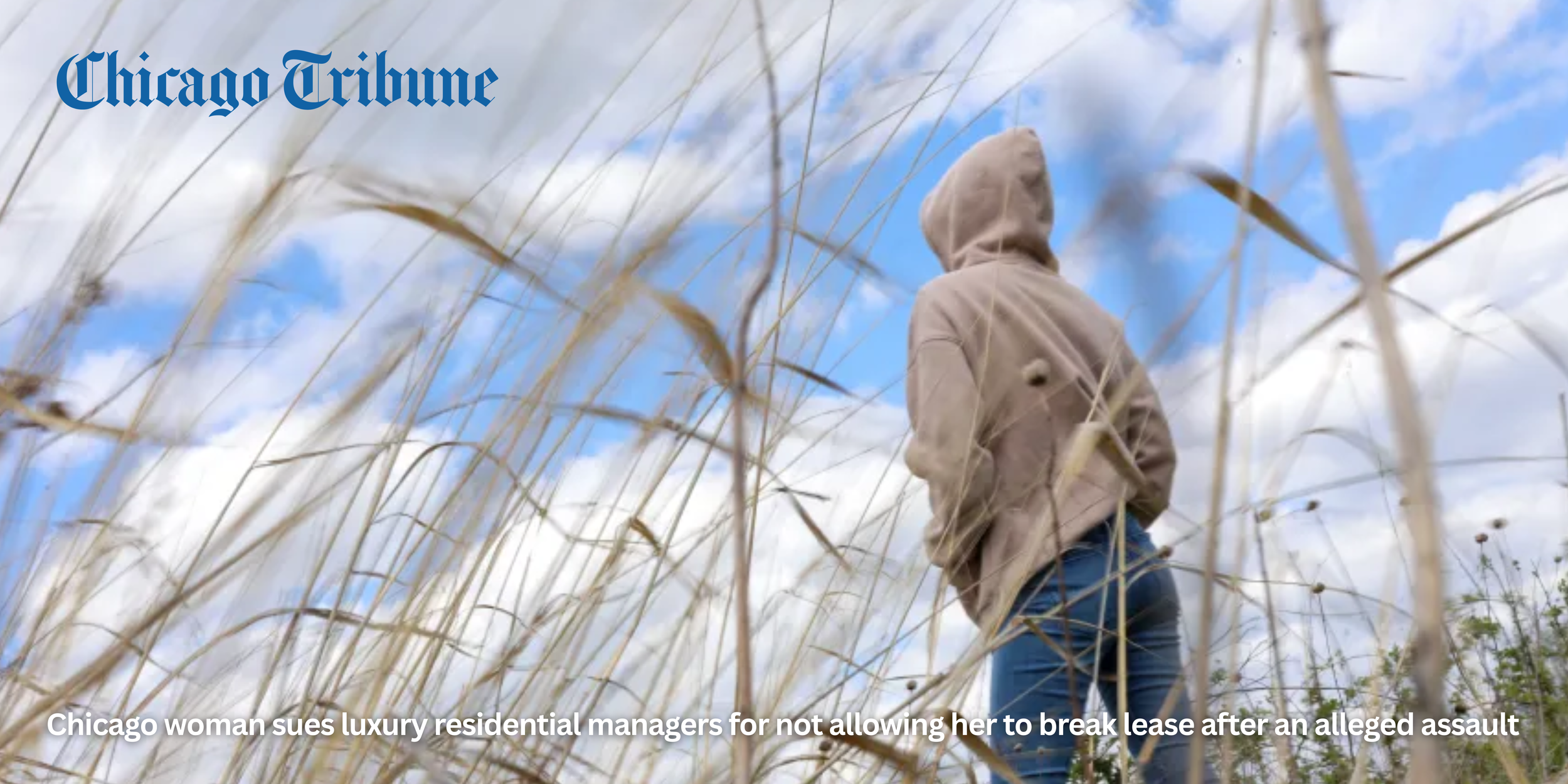 A person in a beige hoodie and blue jeans walking through tall, dried grass on a cloudy day with blue sky and white clouds. The image has a Chicago Tribune logo and headline about a Chicago woman suing luxury residential managers.