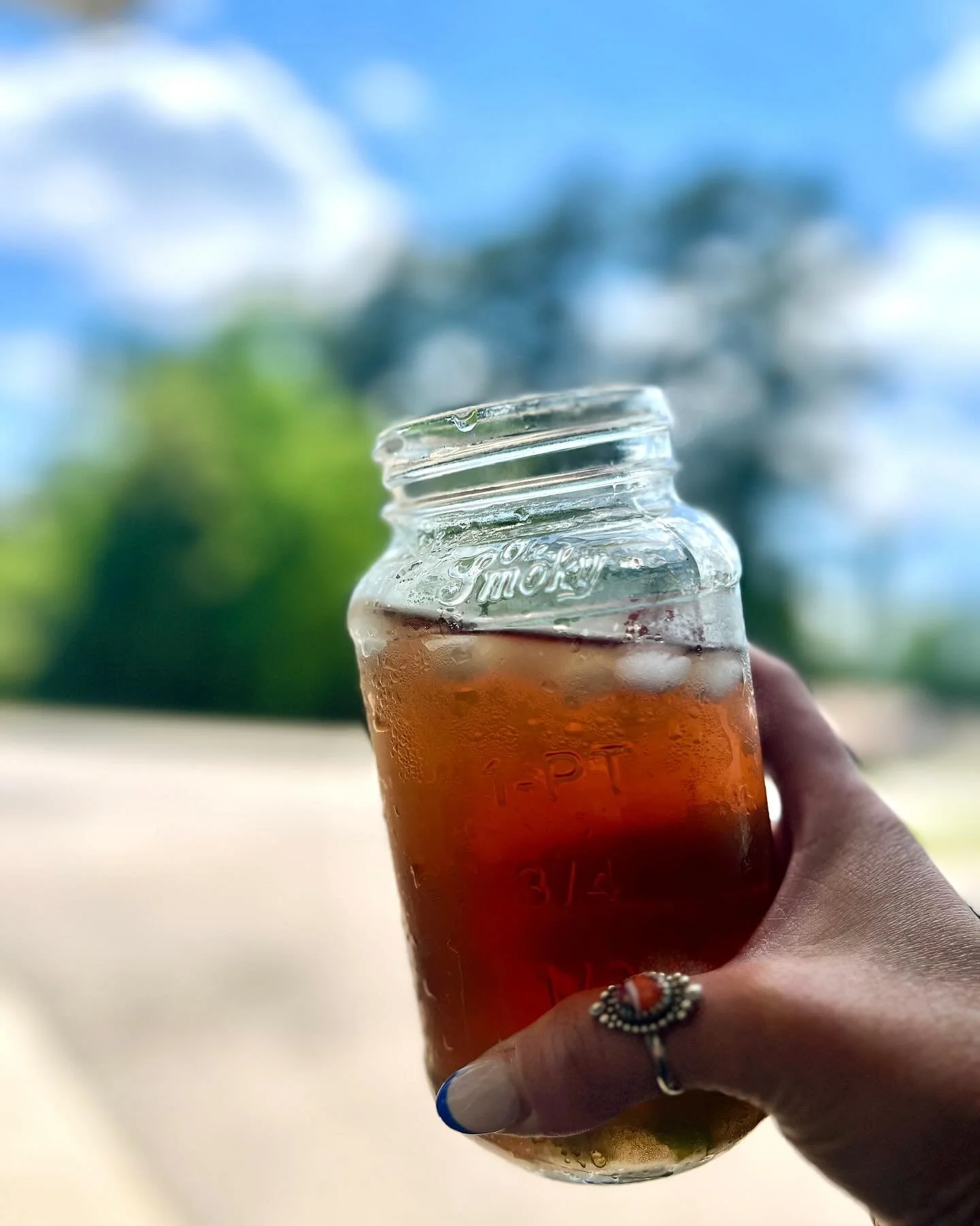 It&rsquo;s 93 degrees and that calls for iced tea. 
Lemon balm and 2 kinds of mint (yes, from the garden again) for this bad boy that I put in an empty ole Smokey jar 💚🌿🫙
Too much to do today or I&rsquo;d spike it with some lemon vodka 

#eventbar