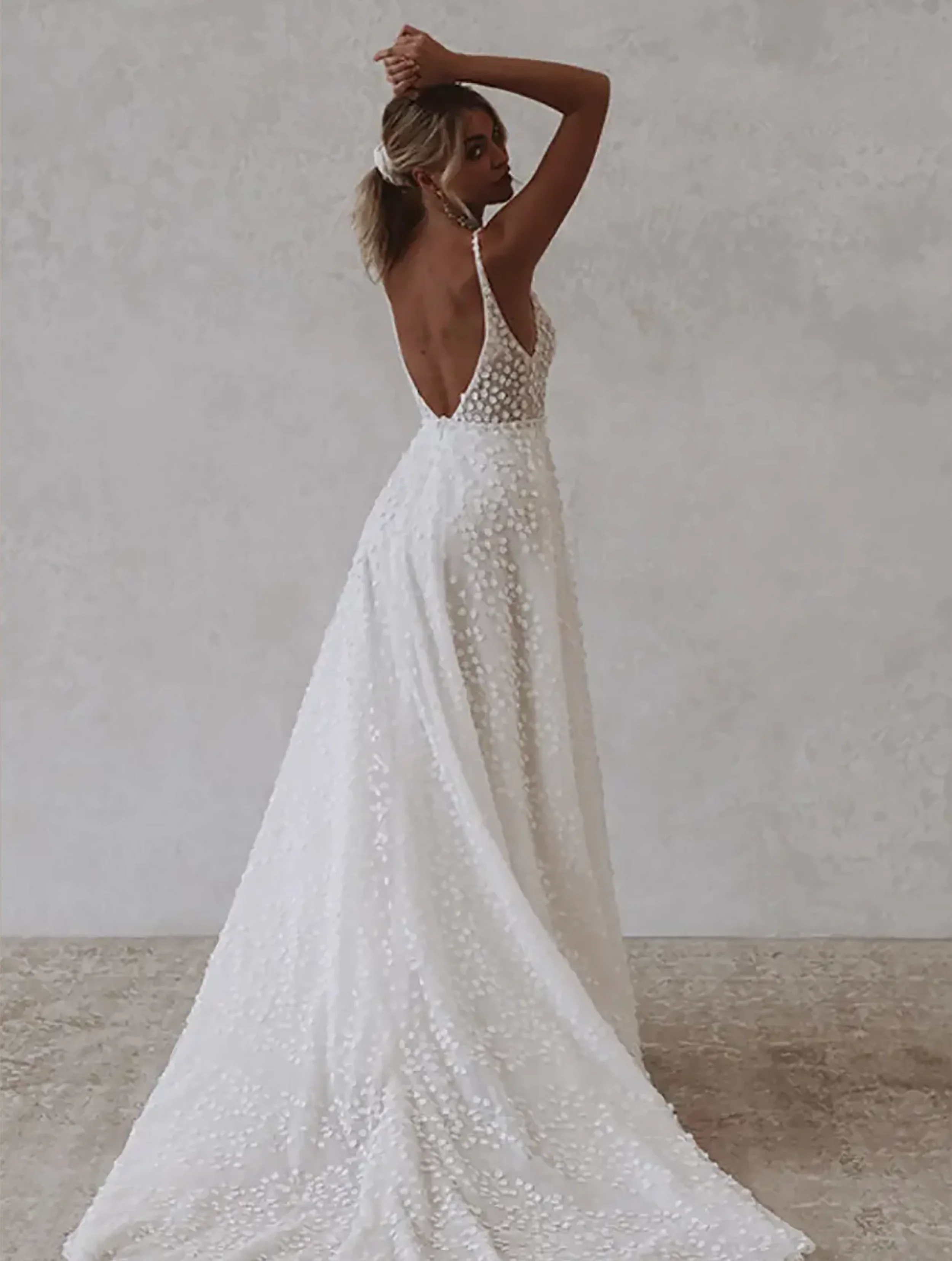 louie-flowy-wedding-gown-by-mwl-bride-made-with-love-full-back-view-of-dress.webp