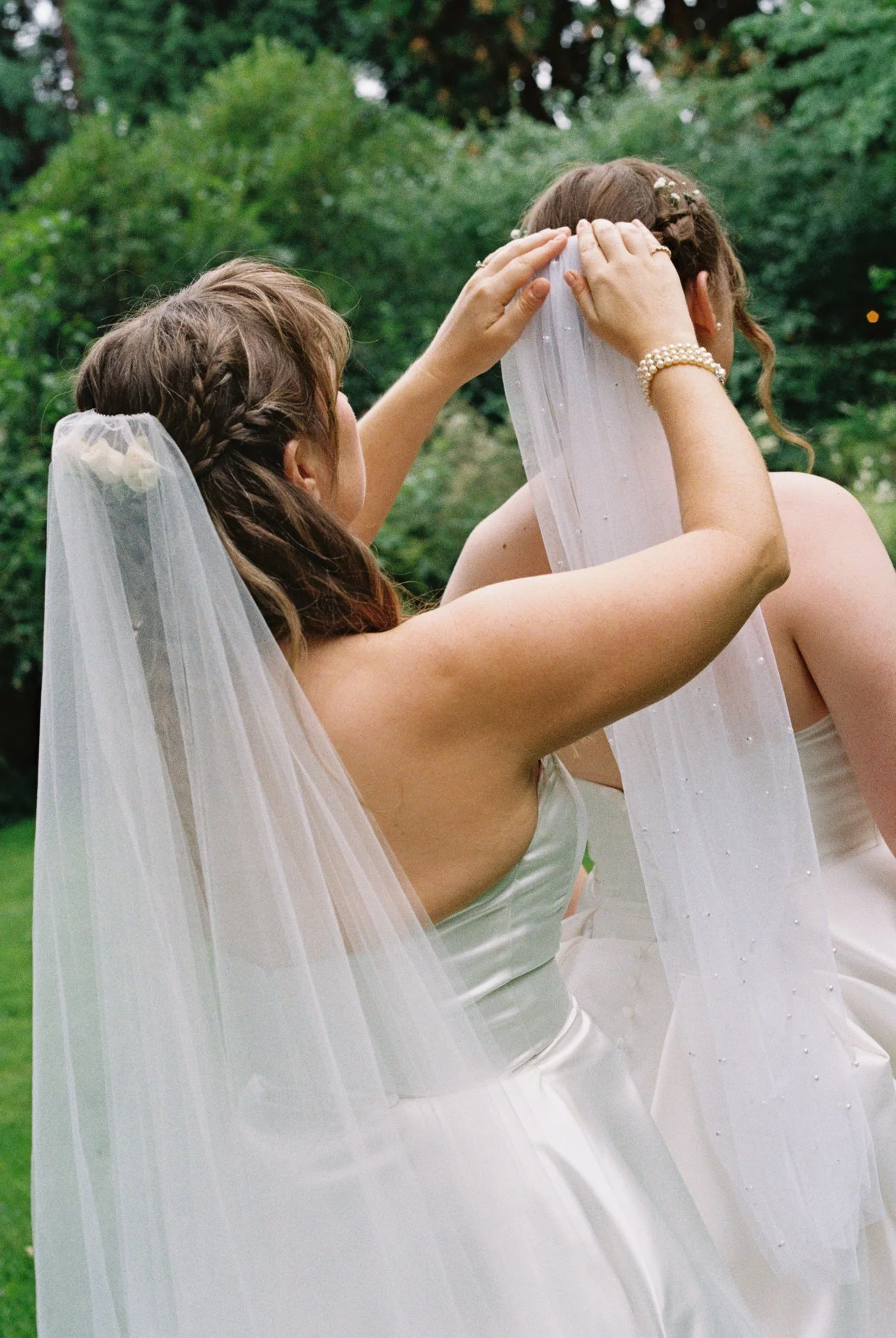 two brides, LGBTQ+, captured on a wedding in Hillsboro Octagonal Barn at McMenamins