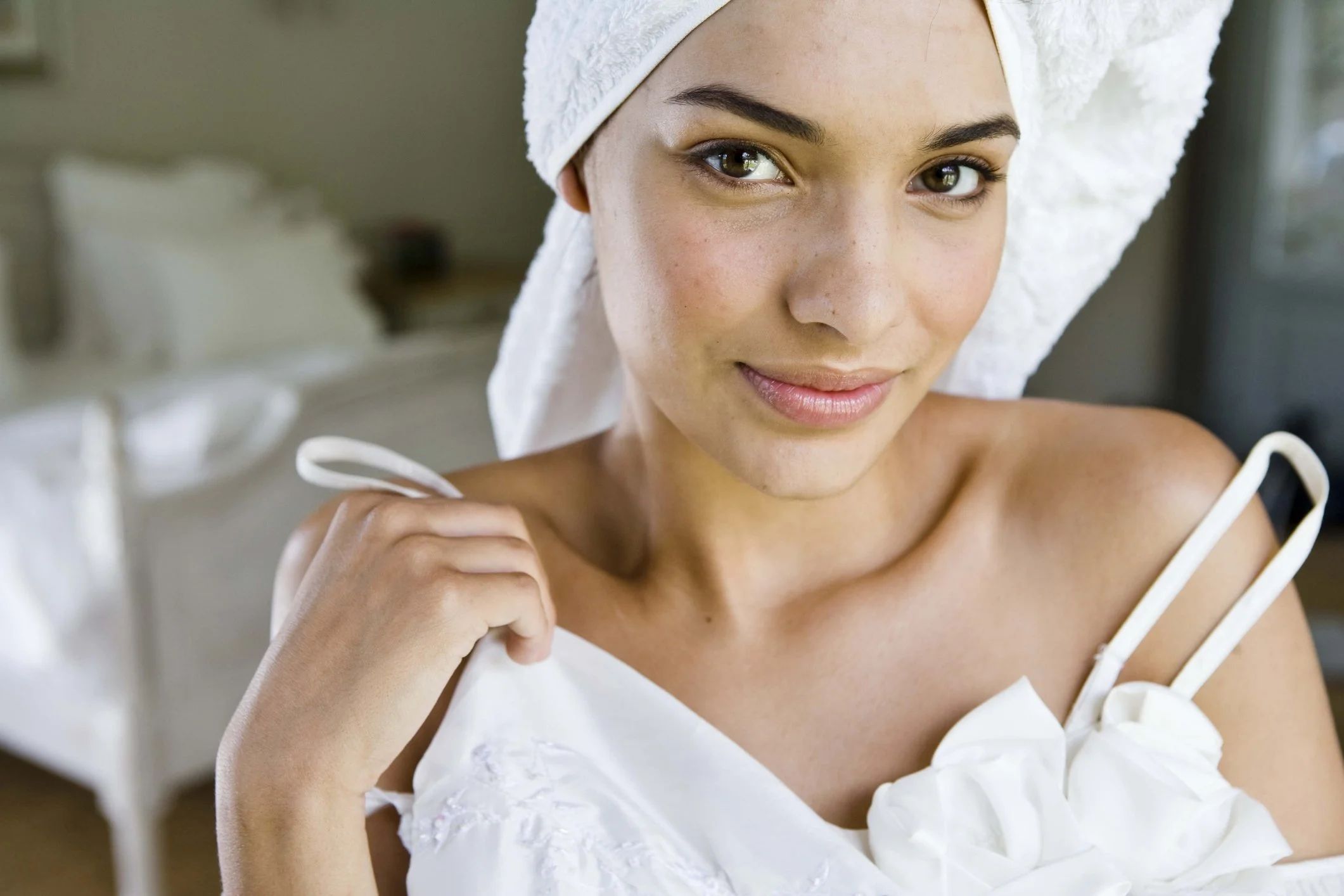 Bride during pre-wedding skincare and bridal beauty prep