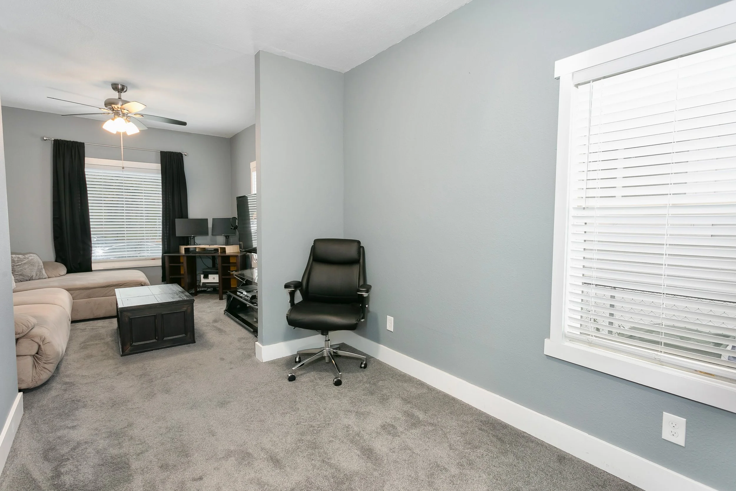 Downstairs large bedroom (formerly 2 rooms) with 2 closets and plenty of natural light.