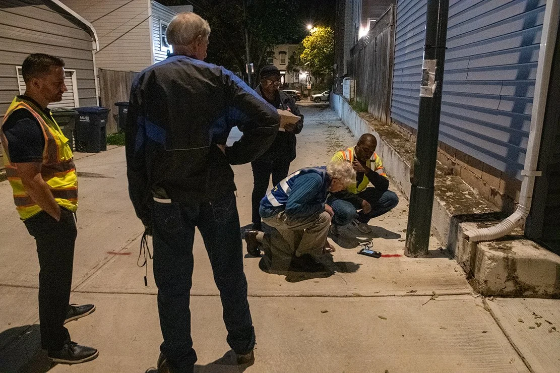 (Photo: DarkSky DC volunteers conduct streetlight luminance monitoring and meet with DC officials to compare their methodologies).